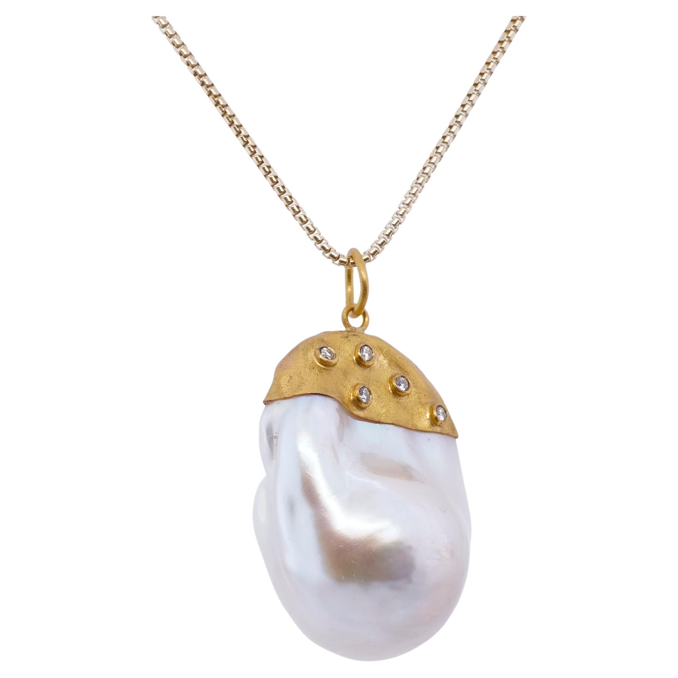 Large, 64ct Baroque Pearl Pendant Necklace with Diamonds, 24kt Solid Gold by Prehistoric Works of Istanbul, Turkey. Diamonds - 0.06cts. Measures 21.5mm x 33.3mm. Wears well with 22