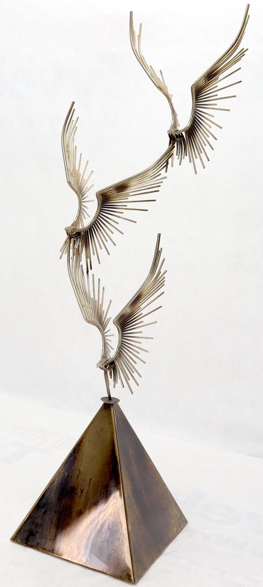 metal sculpture birds