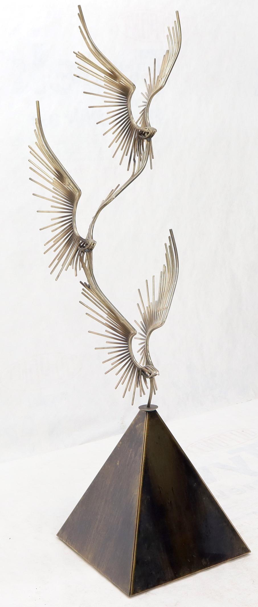 flying birds sculpture