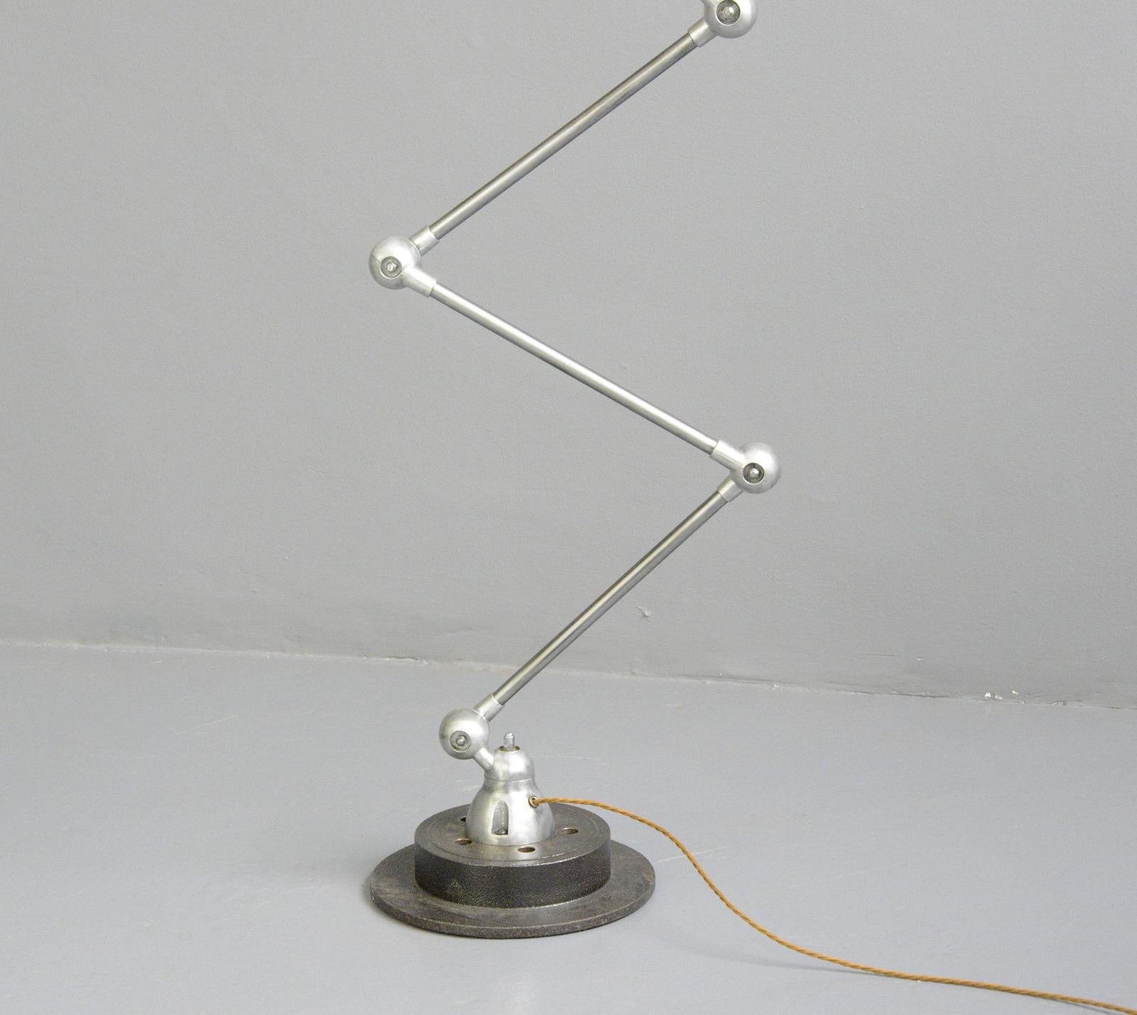 Large 7 arm floor standing jielde lamp, Circa 1950s

- Brushed steel arms 
- Remote control On/Off
- Takes E27 fitting bulbs
- Design by Jean Louis Domecq for Jielde
- French ~ 1950s
- Stands at 200cm tall
- Shade measures 20cm