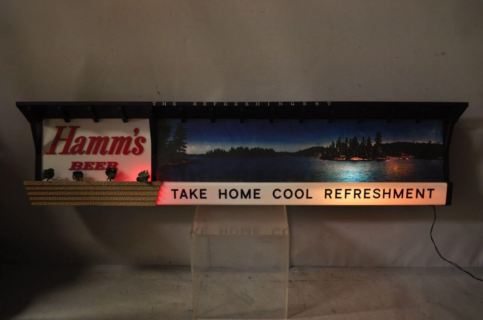 Large vintage Hamm's beer lakeside plastics advertising hanging lighted sign. Item features a large impressive size, lighted interior, 