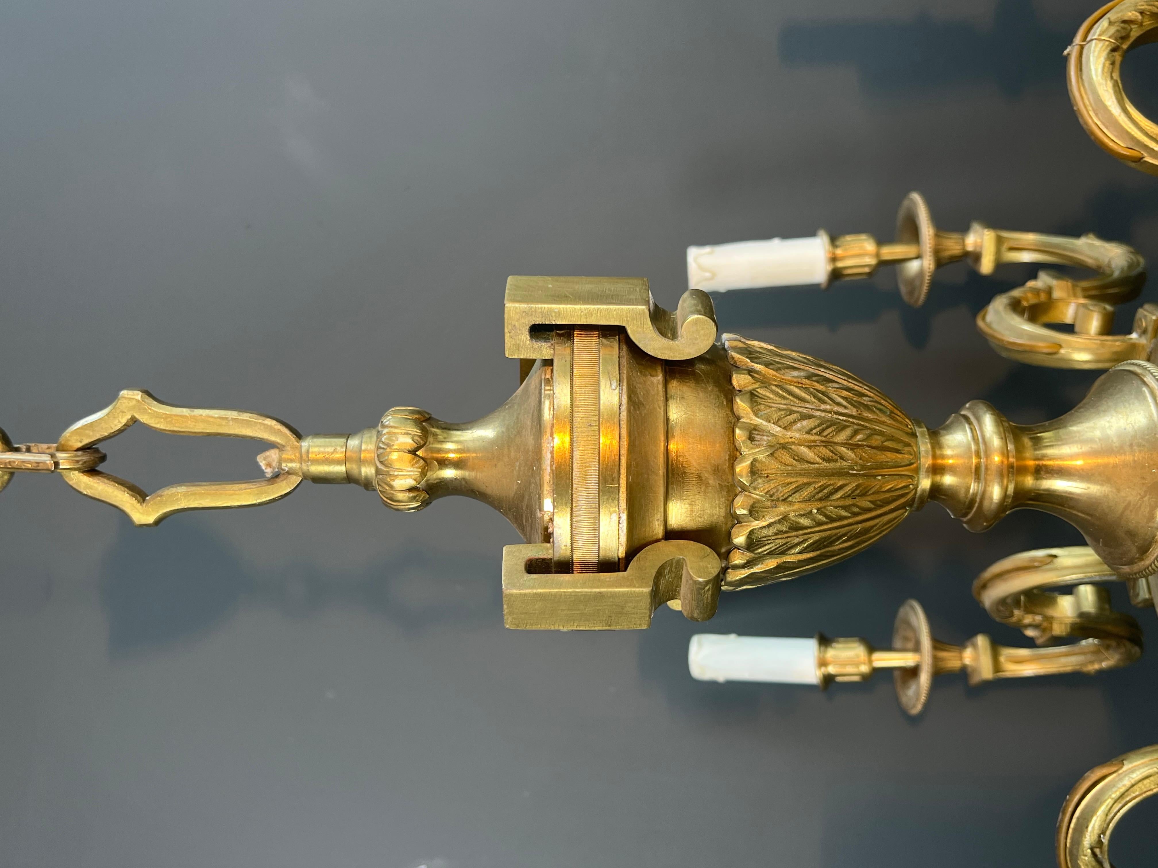 Large 8 Arms Chiseled Bronze Chandelier in the Style of Louis the 16th by Lucien For Sale 9