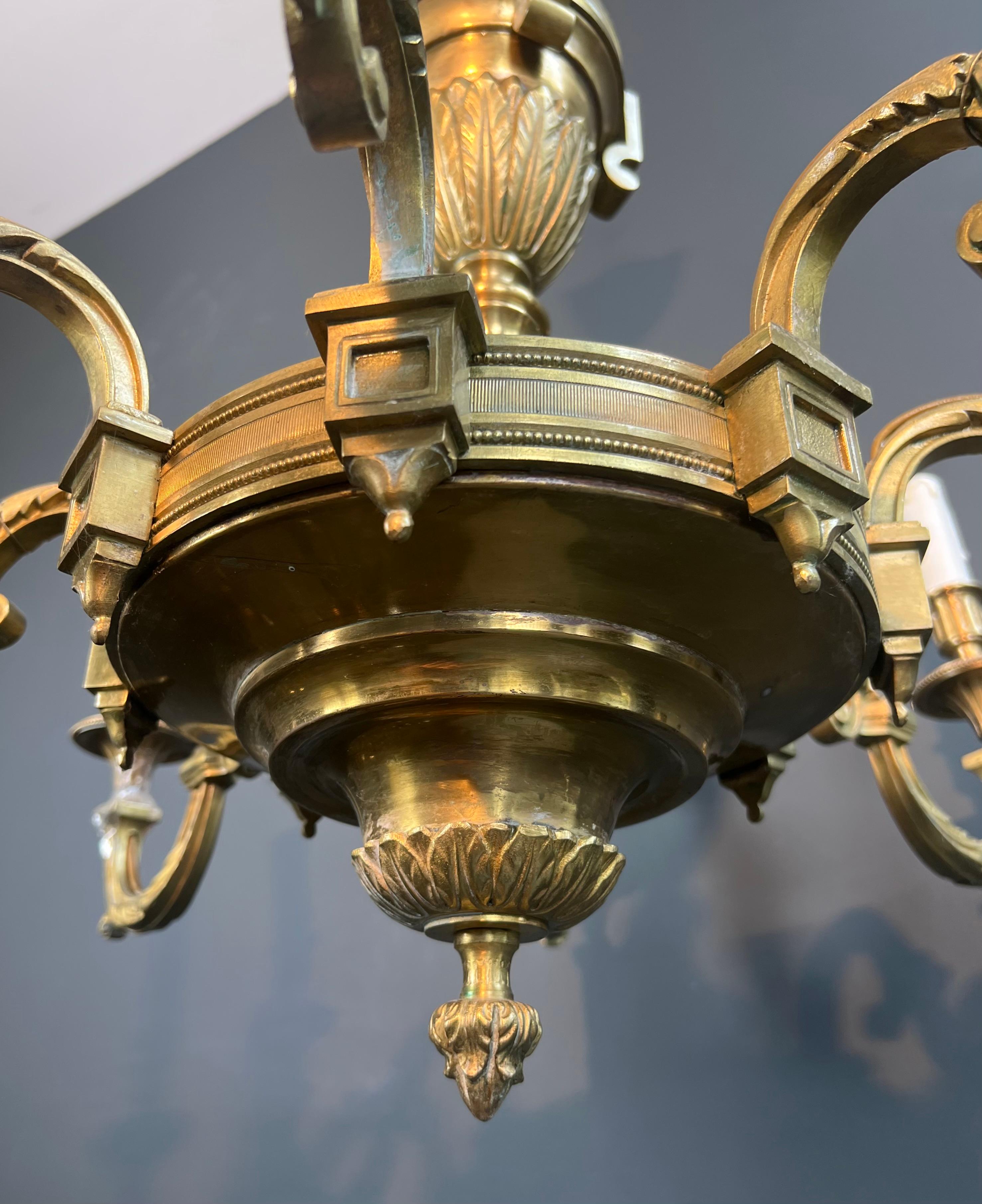 Large 8 Arms Chiseled Bronze Chandelier in the Style of Louis the 16th by Lucien For Sale 10