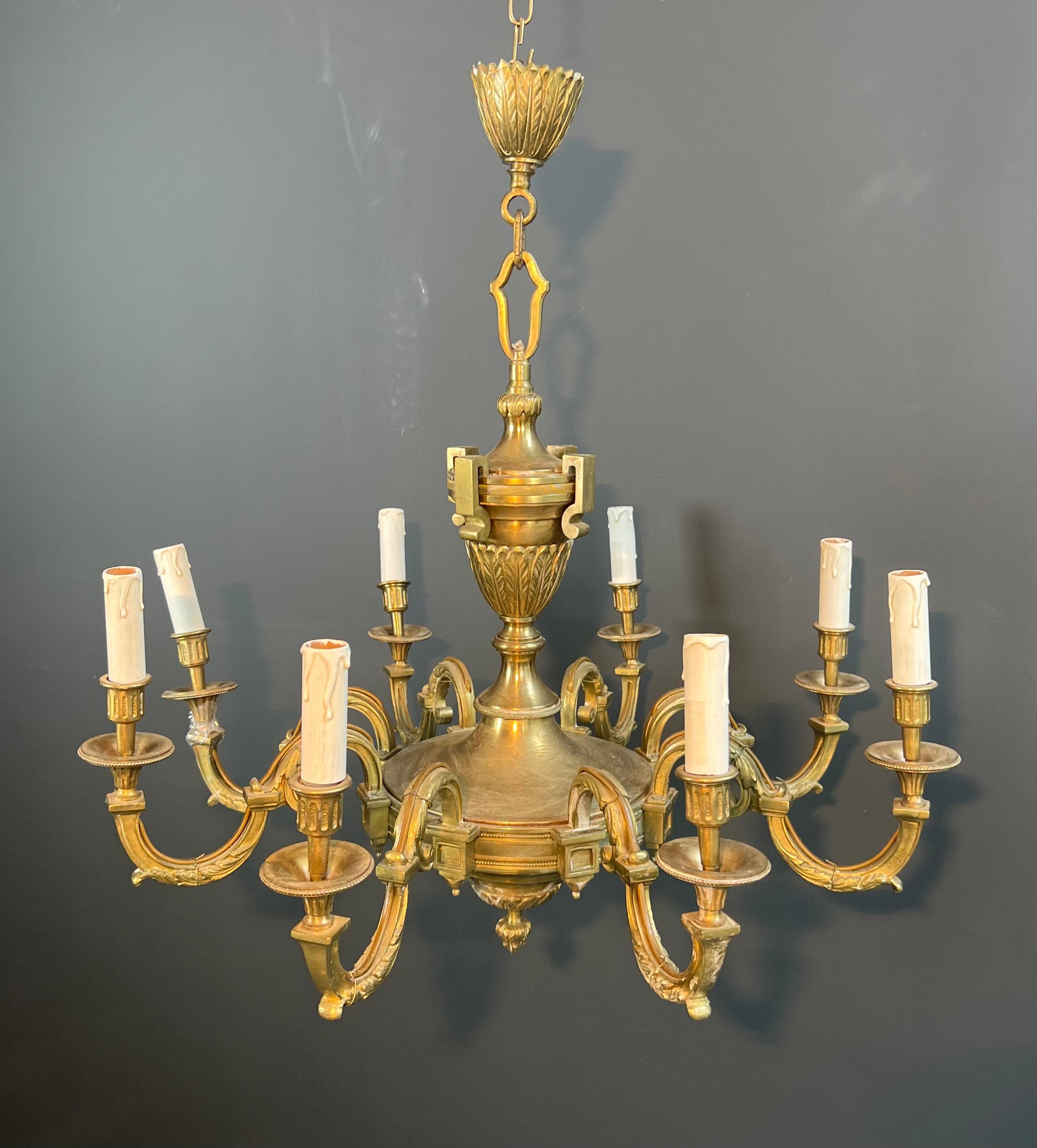 French Large 8 Arms Chiseled Bronze Chandelier in the Style of Louis the 16th by Lucien For Sale