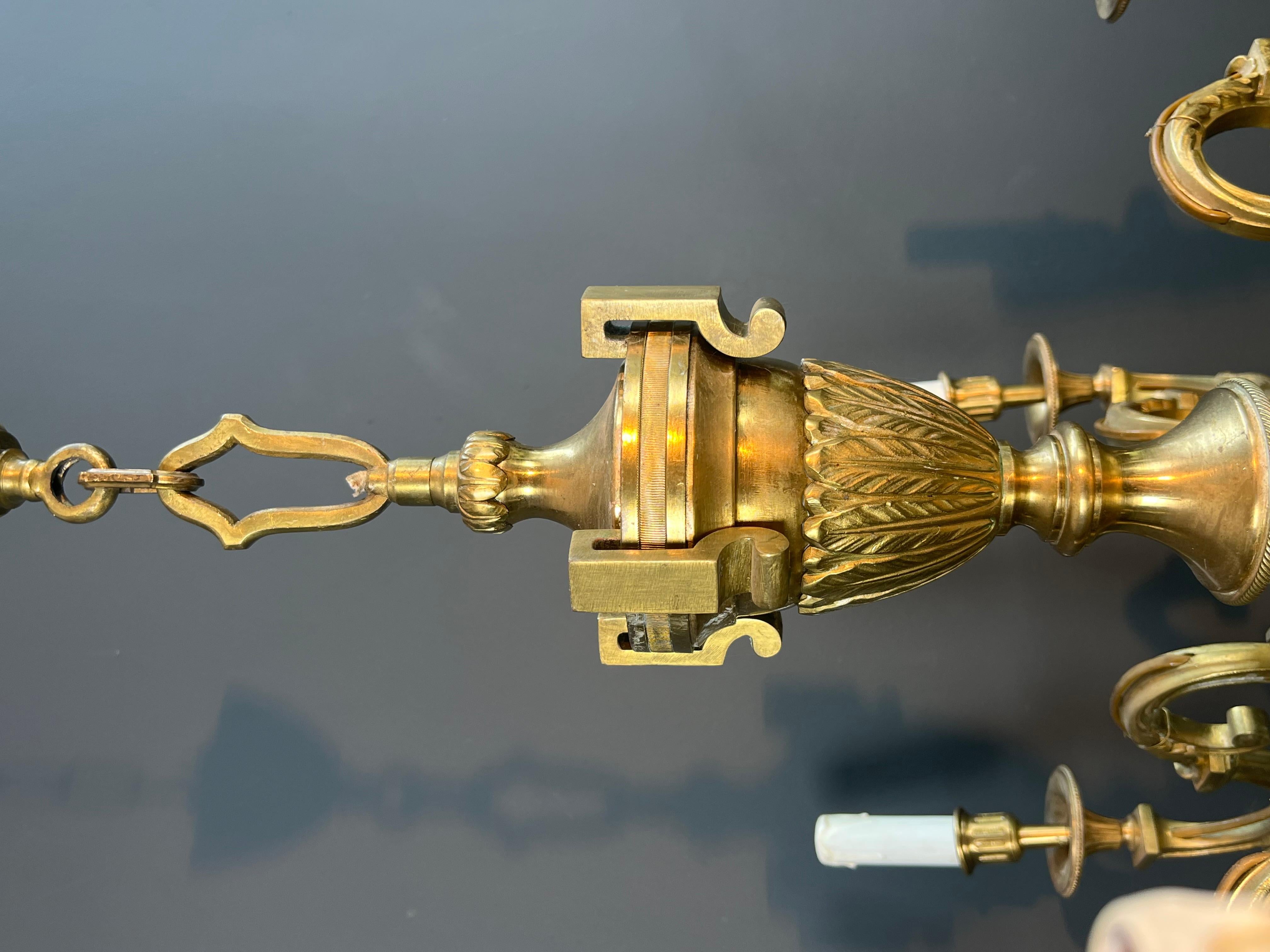 Large 8 Arms Chiseled Bronze Chandelier in the Style of Louis the 16th by Lucien For Sale 1