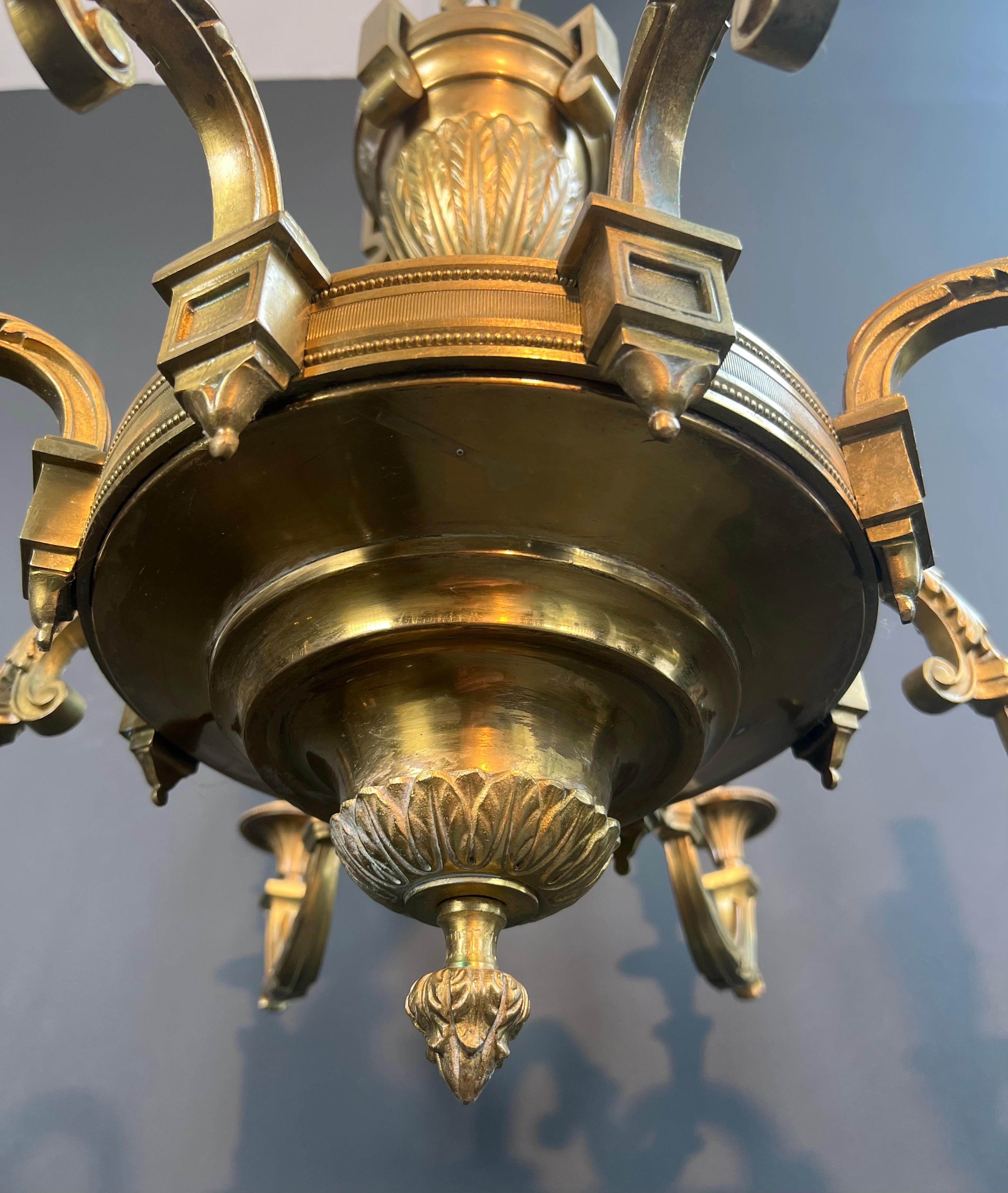 Large 8 Arms Chiseled Bronze Chandelier in the Style of Louis the 16th by Lucien For Sale 3