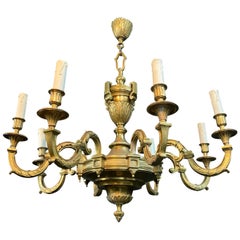 Large 8 Arms Chiseled Bronze Chandelier in the Style of Louis the 16th by Lucien