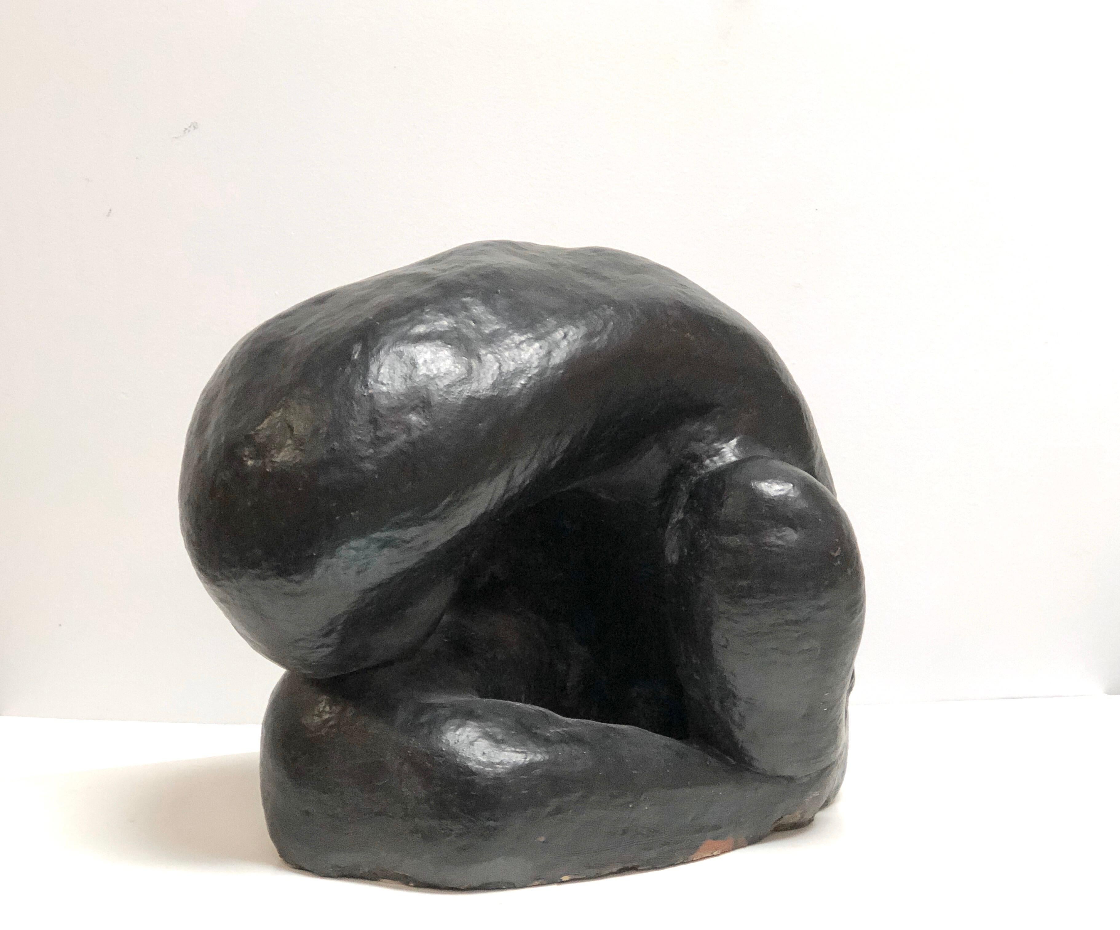 A very large one of a kind ceramic sculpture with a dark glaze. Biomorphic shape that while insinuating the human form is deprived of detail and specifics. The glaze is a dark bronze color.