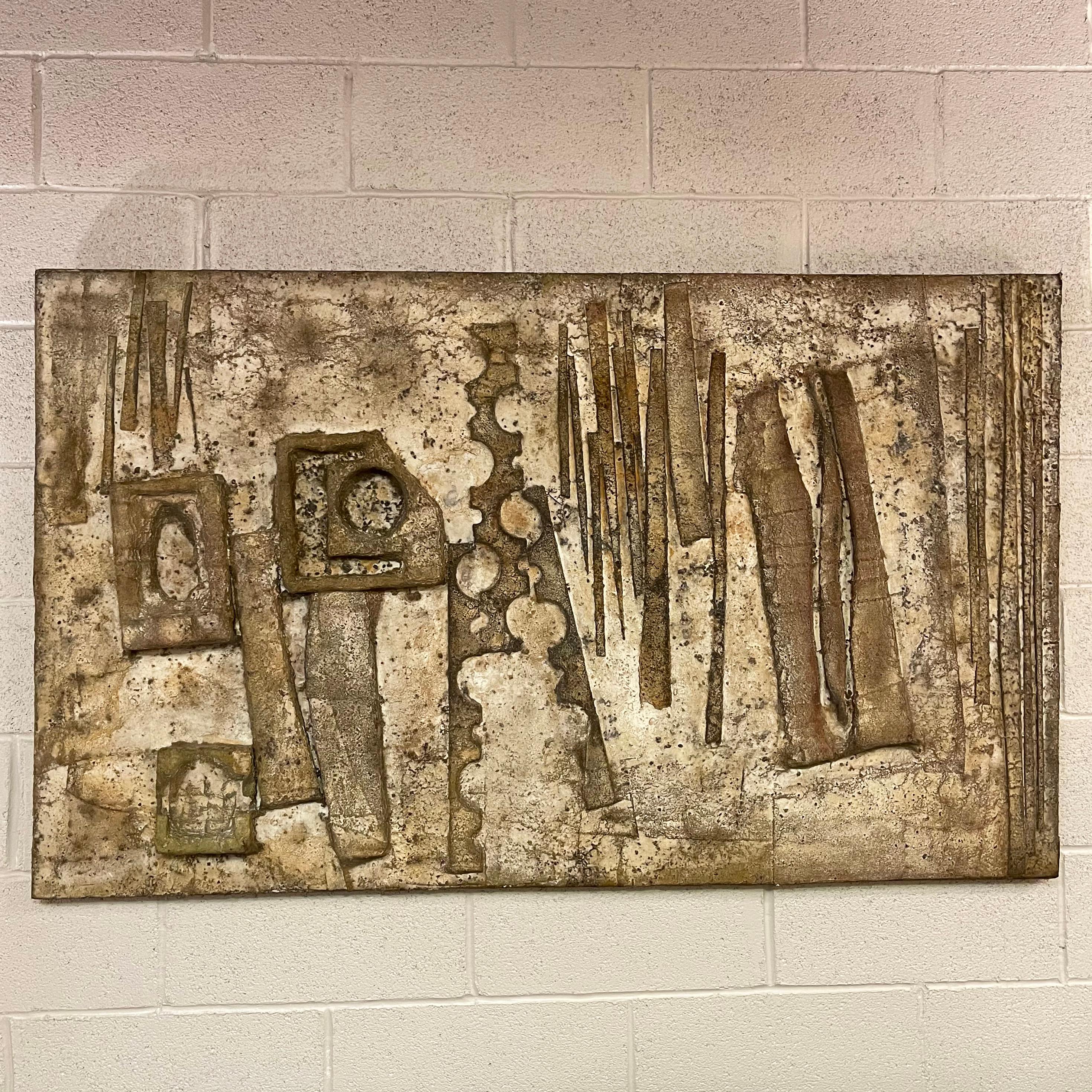 Large, impressive, abstract, dimensional, wall sculpture in distressed, neutral tan and taupe hues features a rough-hewn, brutalist texture. The painting is uniquely constructed of upcycled packaging styrofoam covered in canvas, resin and paint. 
