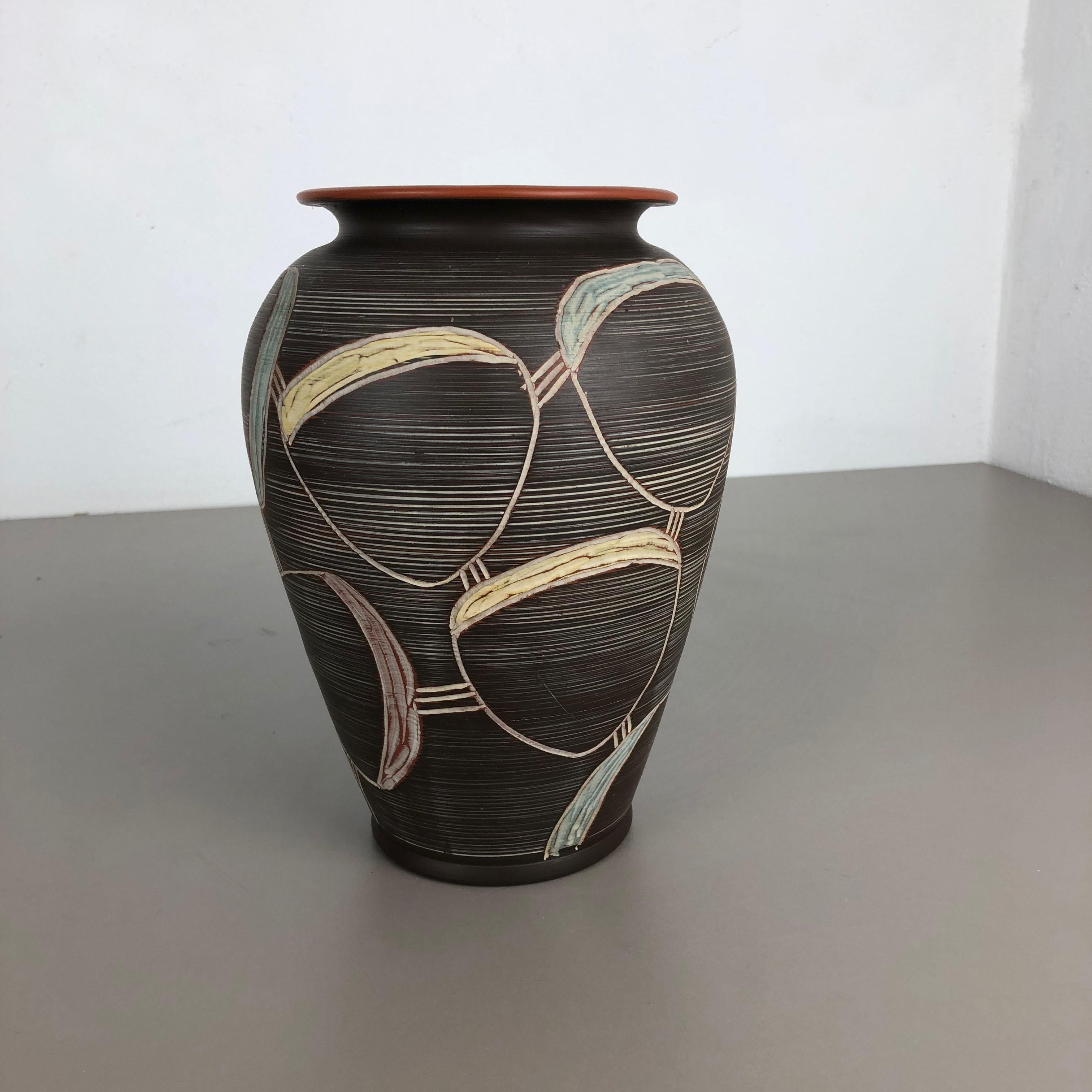 Article:

Pottery ceramic vase


Producer:

Sawa Ceramic, Germany


Design:

Franz Schwaderlapp



Decade:

1950s



Description:

Original vintage 1960s pottery ceramic vase in Germany. High quality German production with a