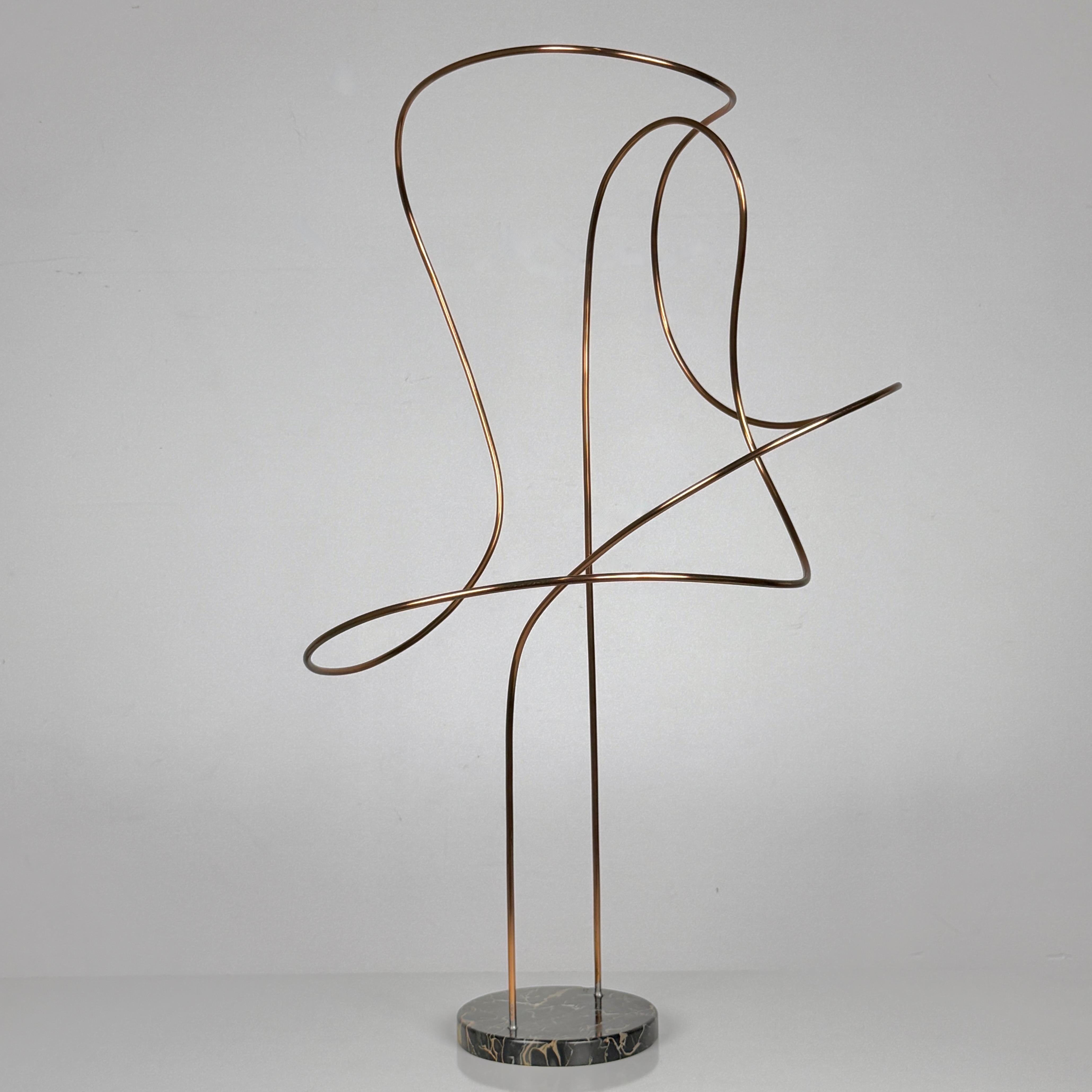 A large scale wire sculpture by Detroit artist James Nani (1926-2016)
Circa 1970s

Free form sculpture executed in tubular copper wire and mounted to a black marble base

18 inch diameter
33.5 inch height

Signed to underside