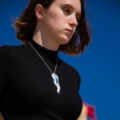 Large Abstract Sculptural Chased Silver Contour Pendant with Pastel Blue Glass