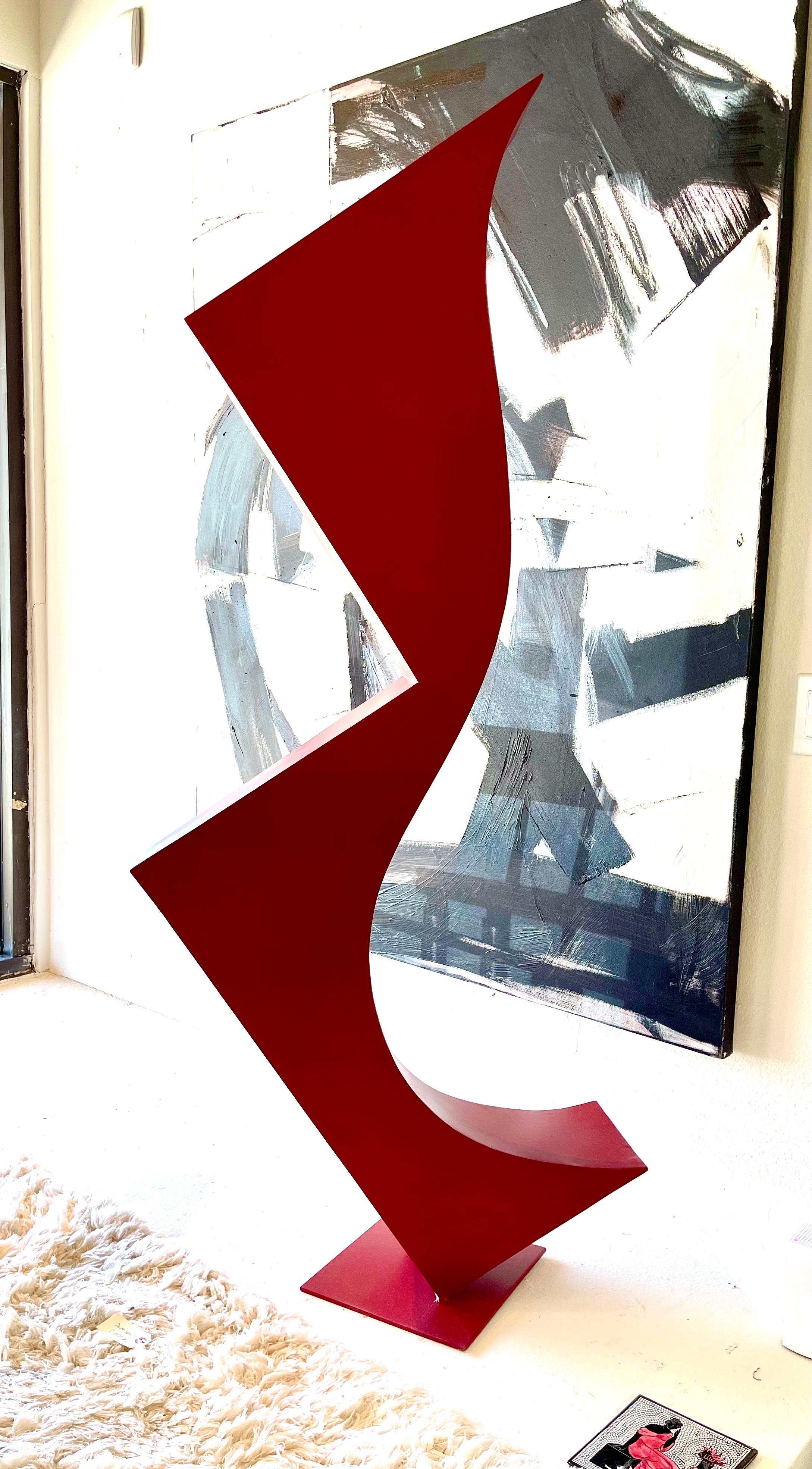 A large 5 foot tall painted steel sculpture. Sinuous and great color. Not signed. 60 1/2 inches tall. In good condition.
  