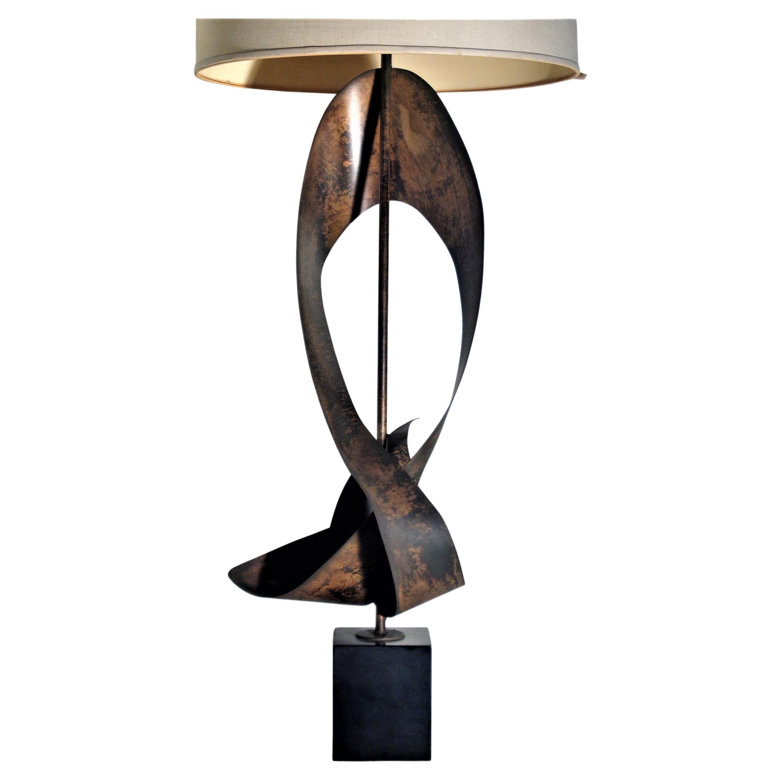 Large sculptural abstract patinated metal ribbon lamp by Harold Weiss / Richard Barr for Laurel in all original condition. Circa 1960. Measures 56