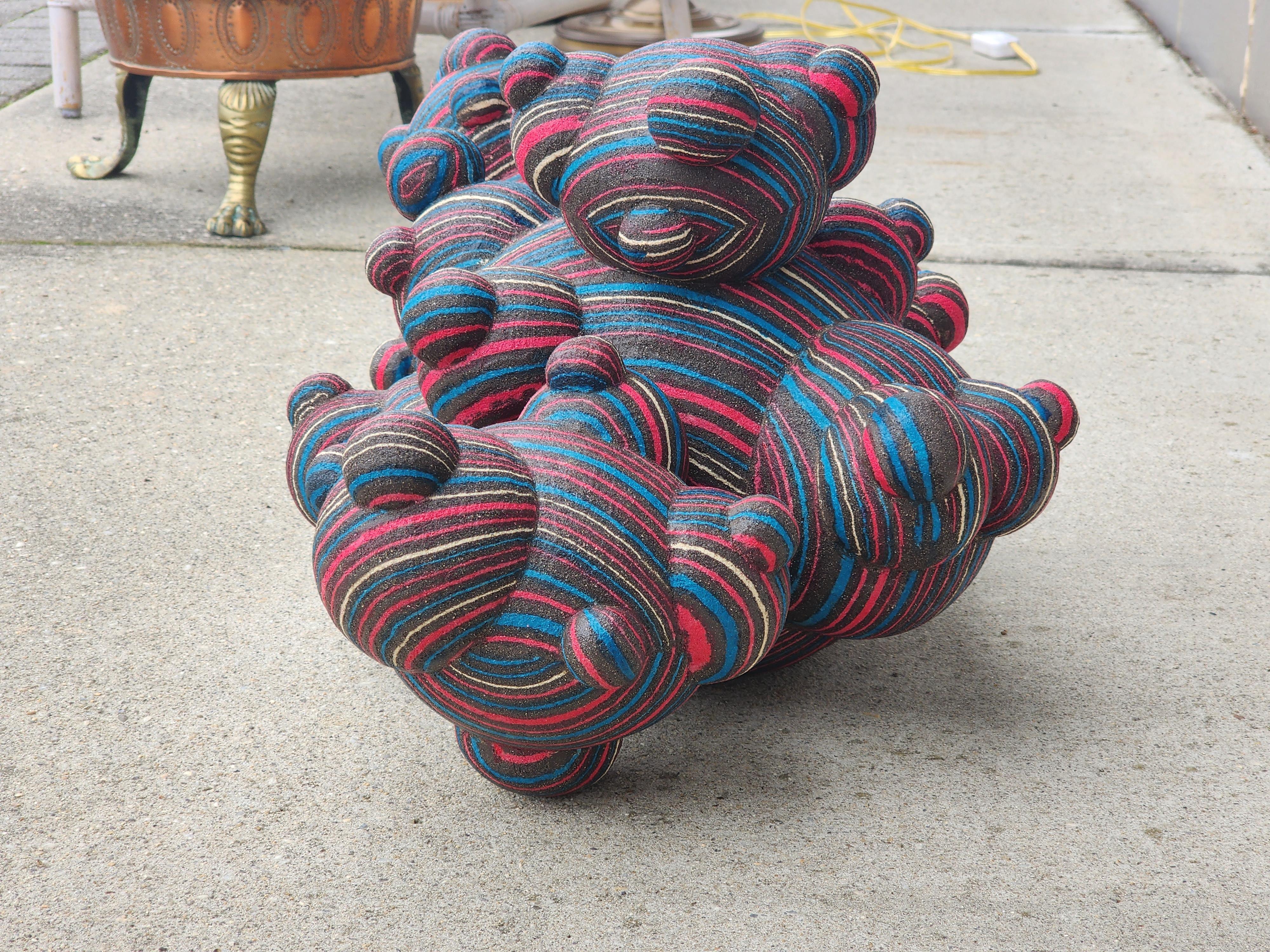 A large freeform organic 'spore' sculpture in stoneware hand crafted using the nerikomi technique by Lewis Trimble. The sculpture is constructed using the time consuming process of Nerikomi which is done by using different color clays and building