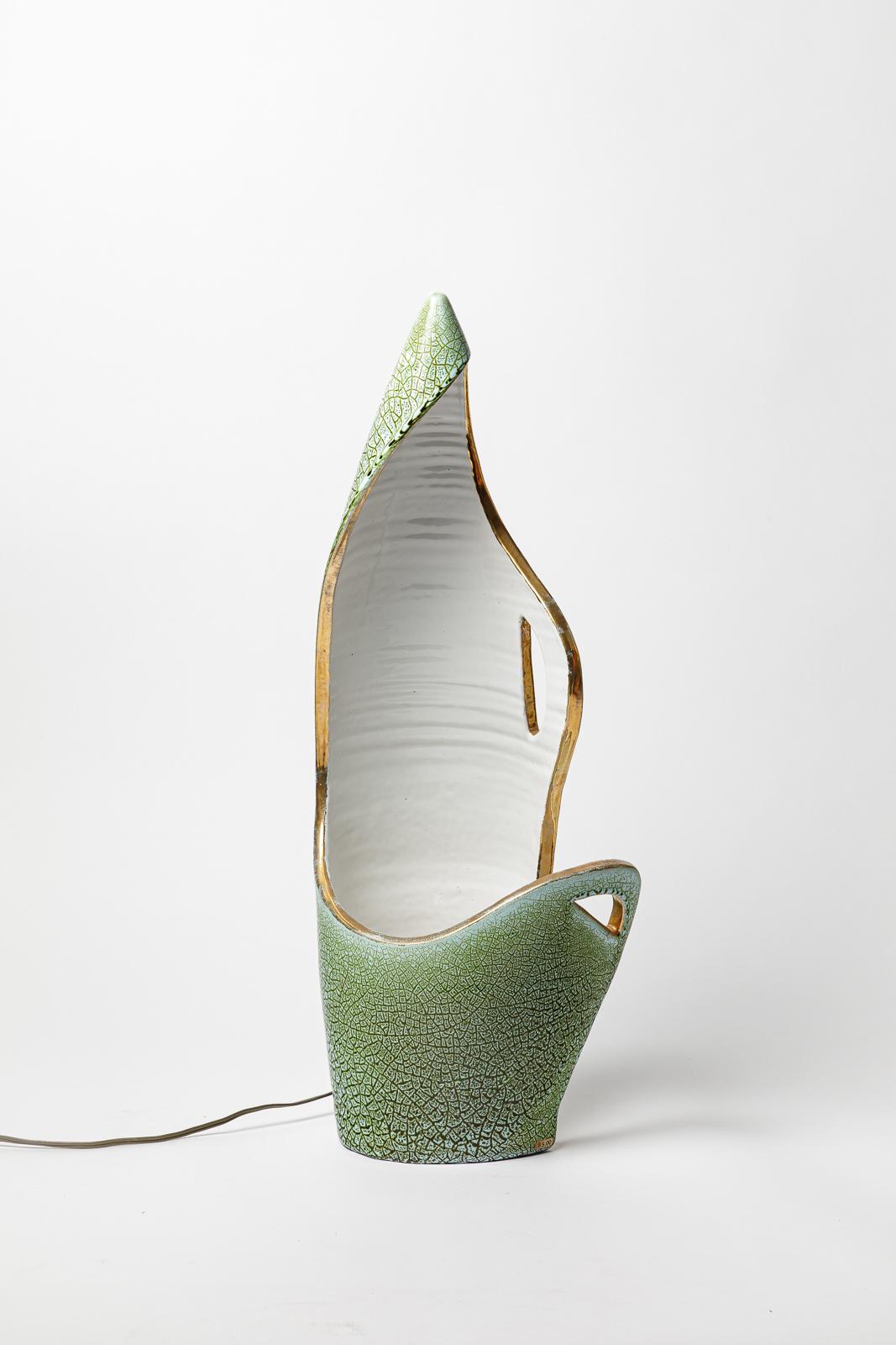 Accolay 

Grande lampe à poser en céramique design du 20e siècle signée ACCOLAY

Couleurs des émaux céramiques blanc, vert et or

Condition originale parfaite.

Signé 

Hauteur 57 cm
Grand 22 cm
Profondeur 17 cm