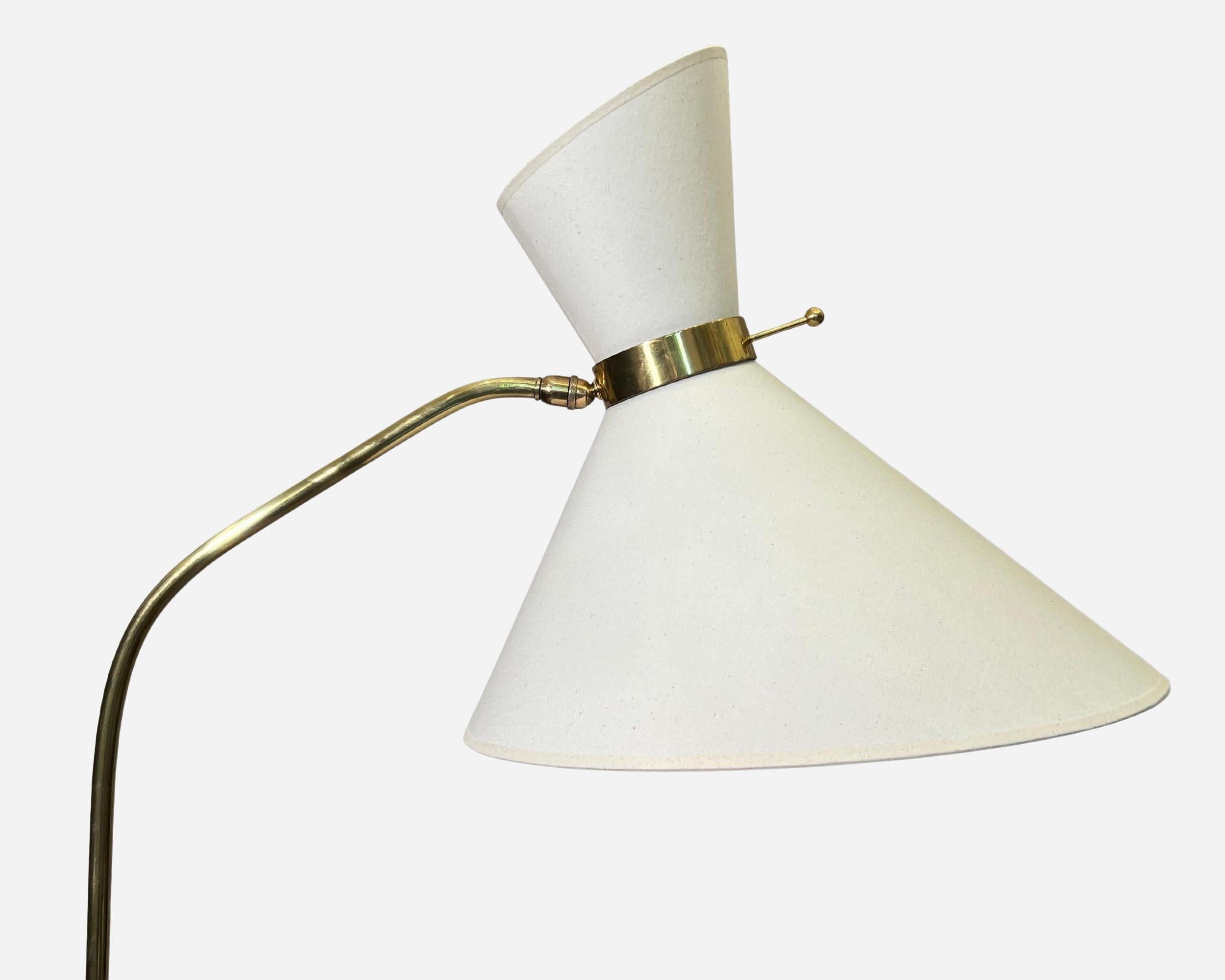 French Large adjustable and extendable floor lamp by Maison Lunel, France circa 1950/60 For Sale
