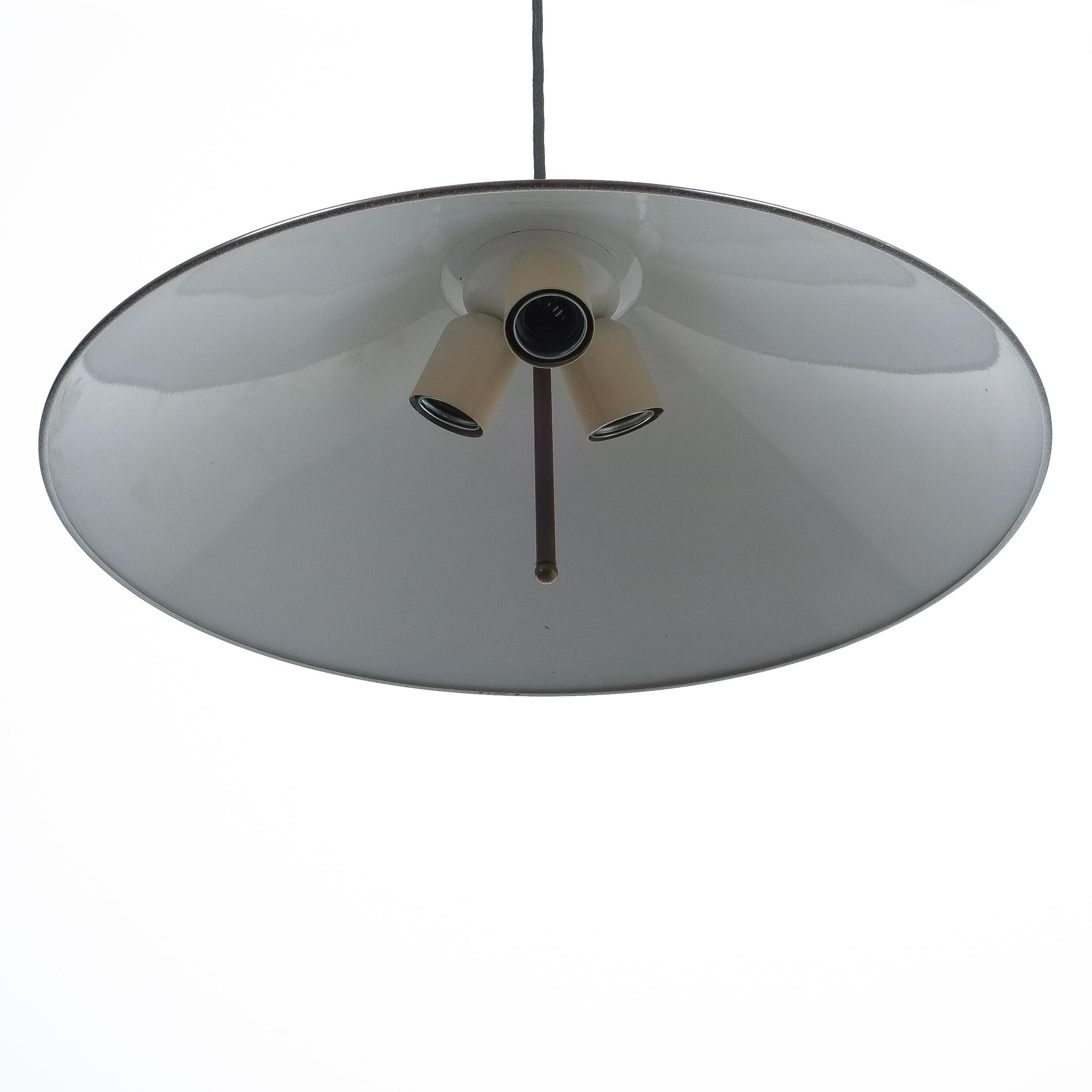 Polished Large Adjustable Brass Counterweight Pendant Lamp by Florian Schulz