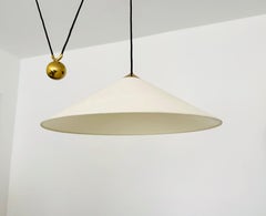Large Adjustable Brass Pendant Lamp with Counterweight by Florian Schulz