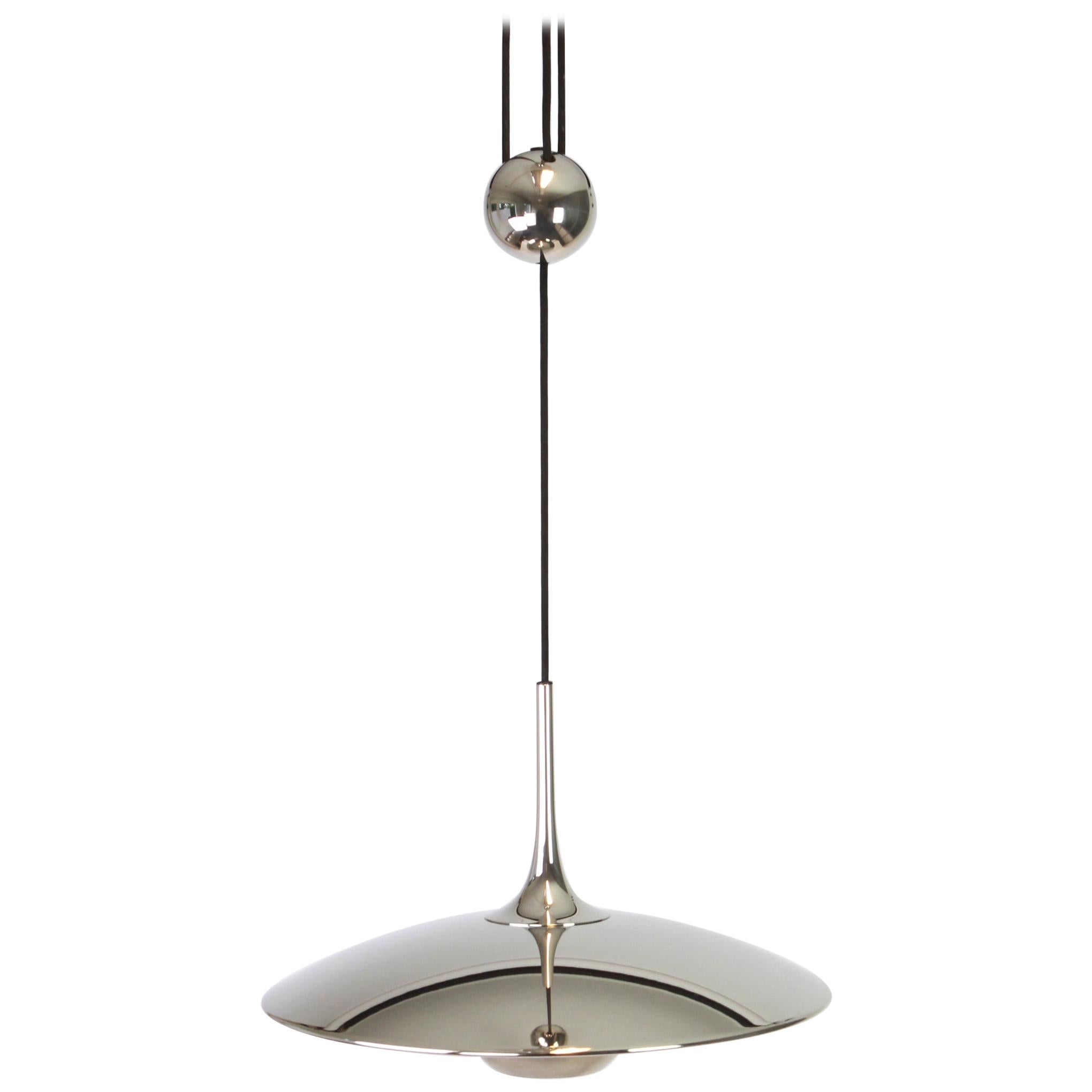 Large adjustable chrome counterweight pendant light designed by Florian Schulz Onos 55, Germany, 1970s.
Socket: 1 x standard bulb - E27 - Up to 150 Watt - and compatible with the US/UK/ etc. standards.

Very good condition.
The listed height is