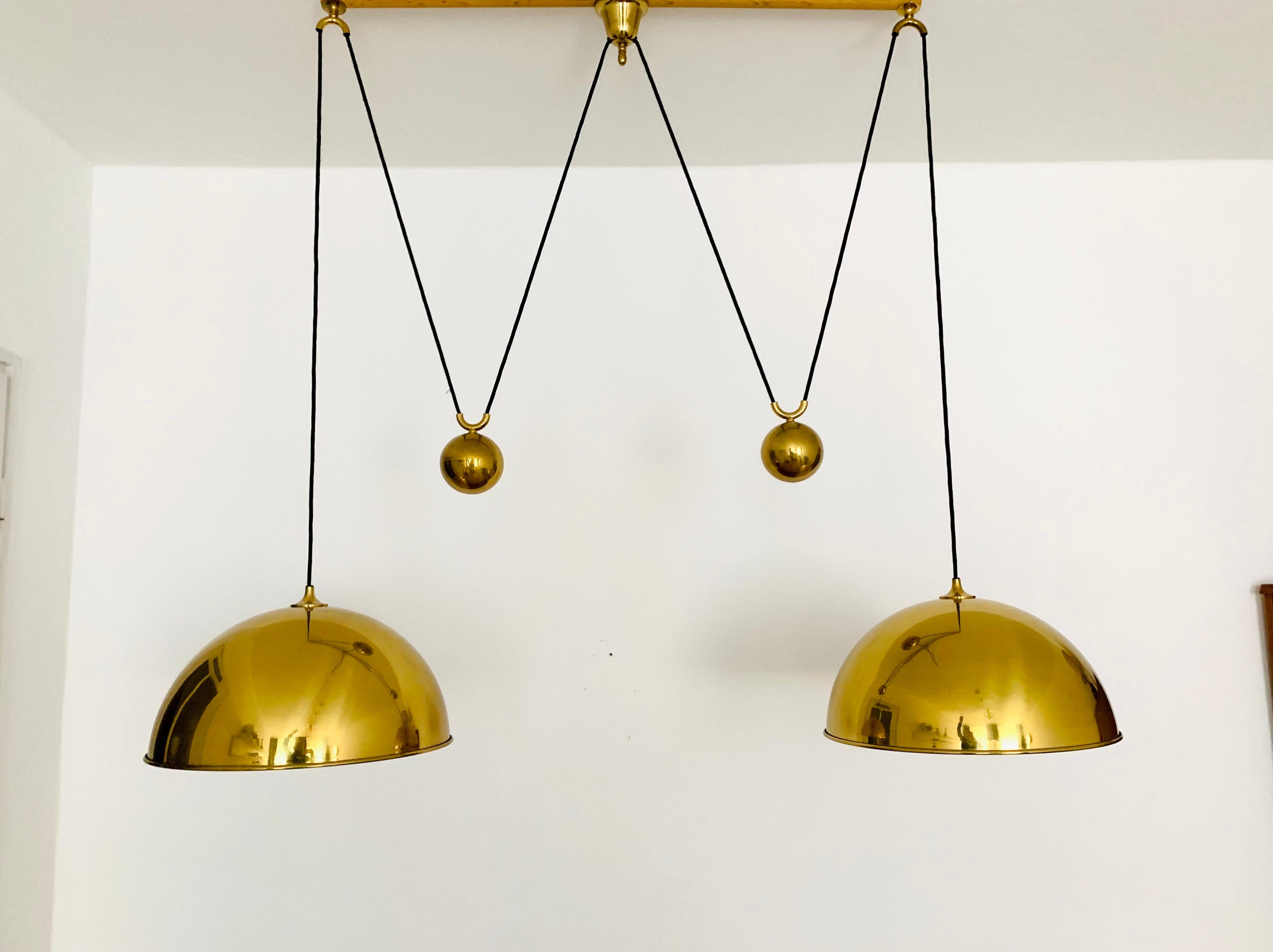 Very beautiful and rare double Posa44 brass ceiling lamp from the 1960s.
The lighting effect of the lamp is extremely beautiful.
The design and the very beautiful details create a very elegant and pleasant light.
The lamp creates a very cozy