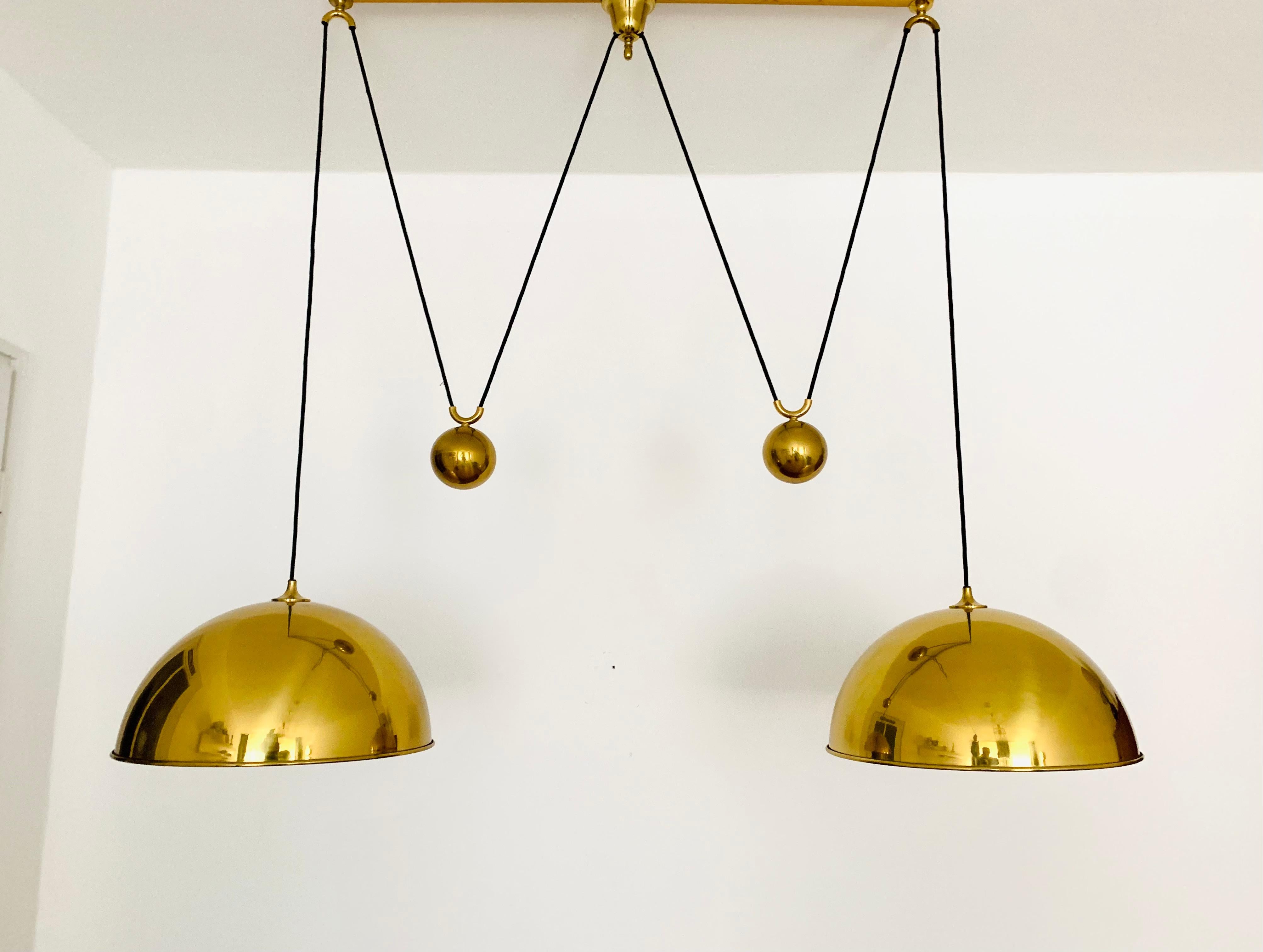 Mid-Century Modern Large Adjustable Double Posa44 Brass Pendant Lamp by Florian Schulz For Sale