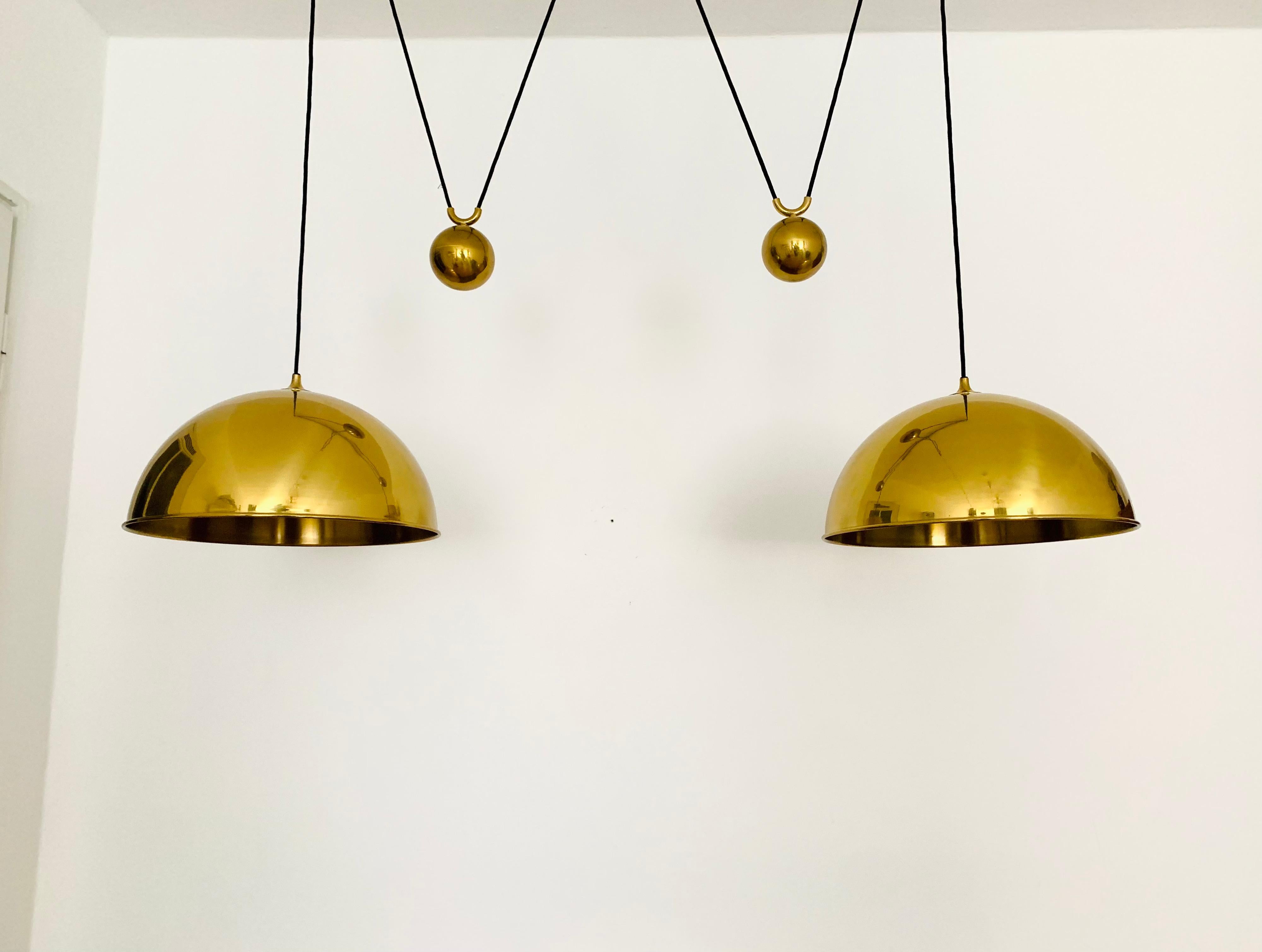 Metal Large Adjustable Double Posa44 Brass Pendant Lamp by Florian Schulz For Sale