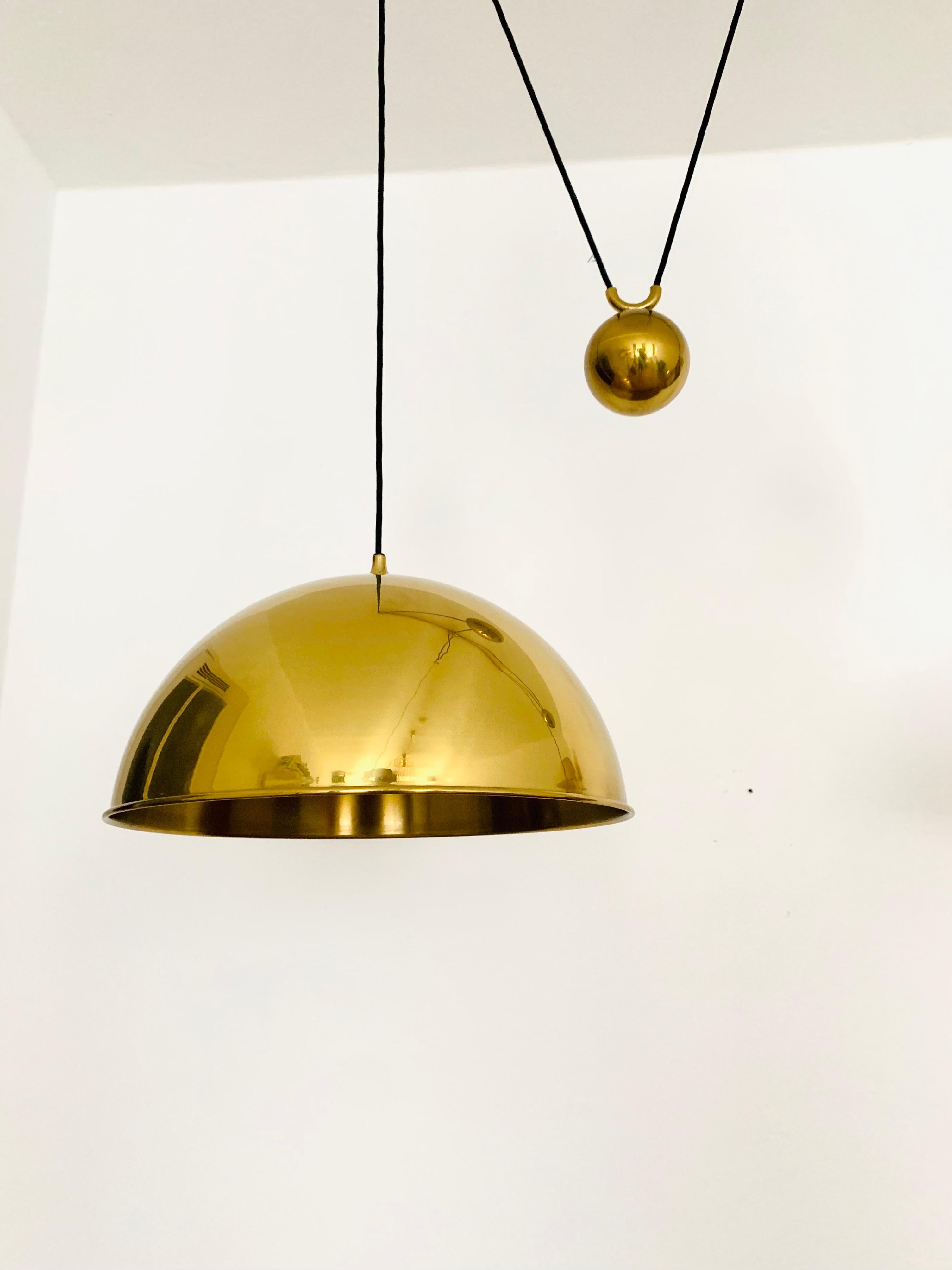 Large Adjustable Double Posa44 Brass Pendant Lamp by Florian Schulz For Sale 1