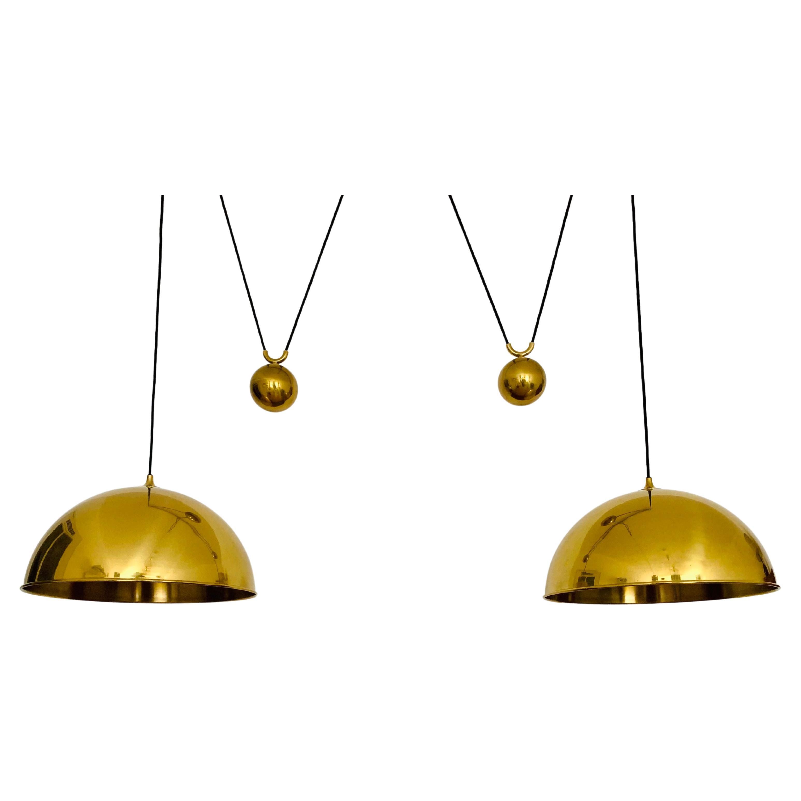 Large Adjustable Double Posa44 Brass Pendant Lamp by Florian Schulz For Sale