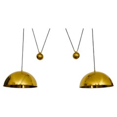 Lampada a sospensione grande regolabile in ottone a doppia mosa44 di Florian Schulz