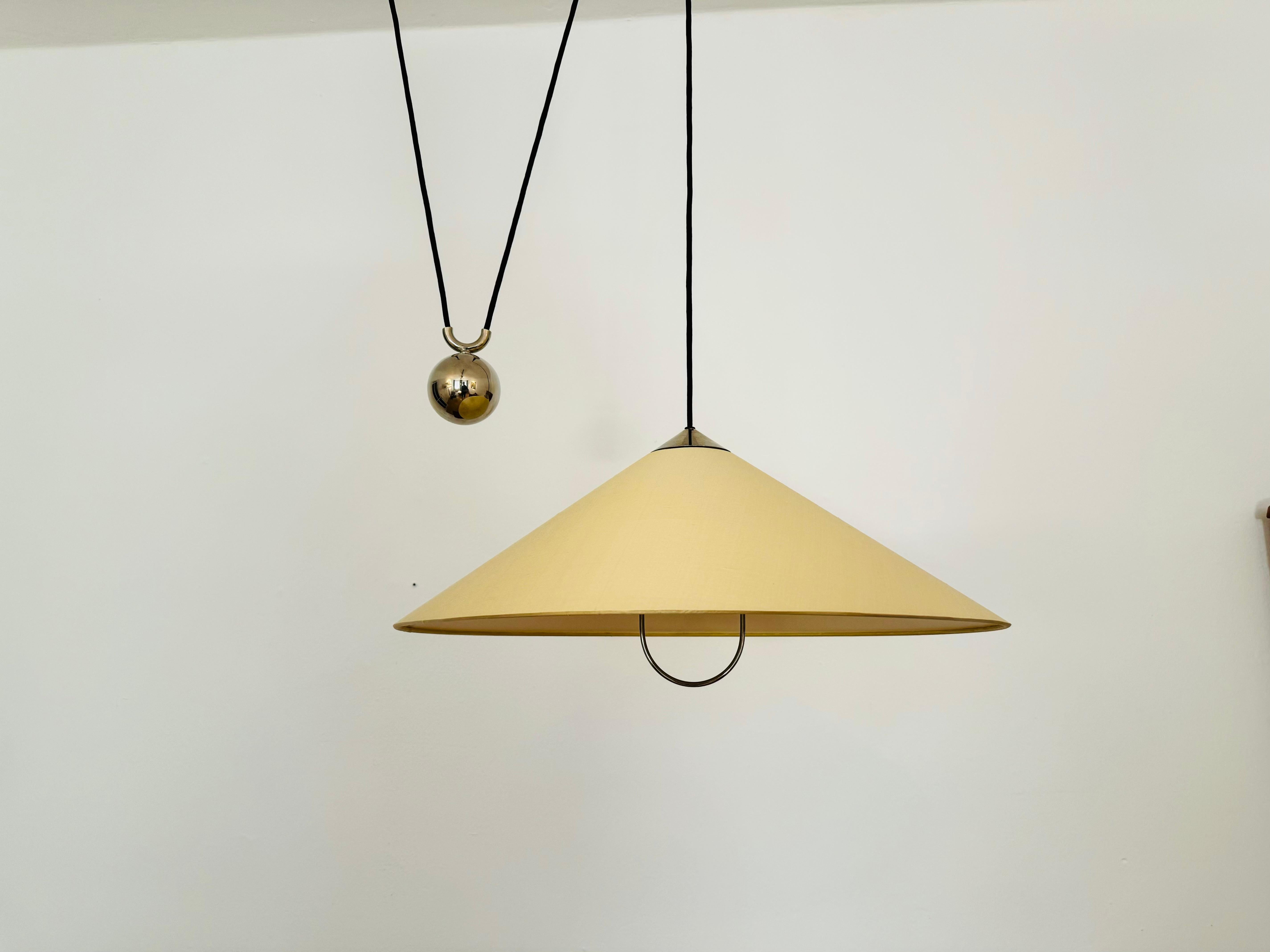 Very nice nickel -plated pendant lamp from the 1960s.
The lighting effect of the lamp is extremely beautiful.
The design and the special lampshade create a very noble and pleasant light.
The lamp ensures a very cozy atmosphere and is very high