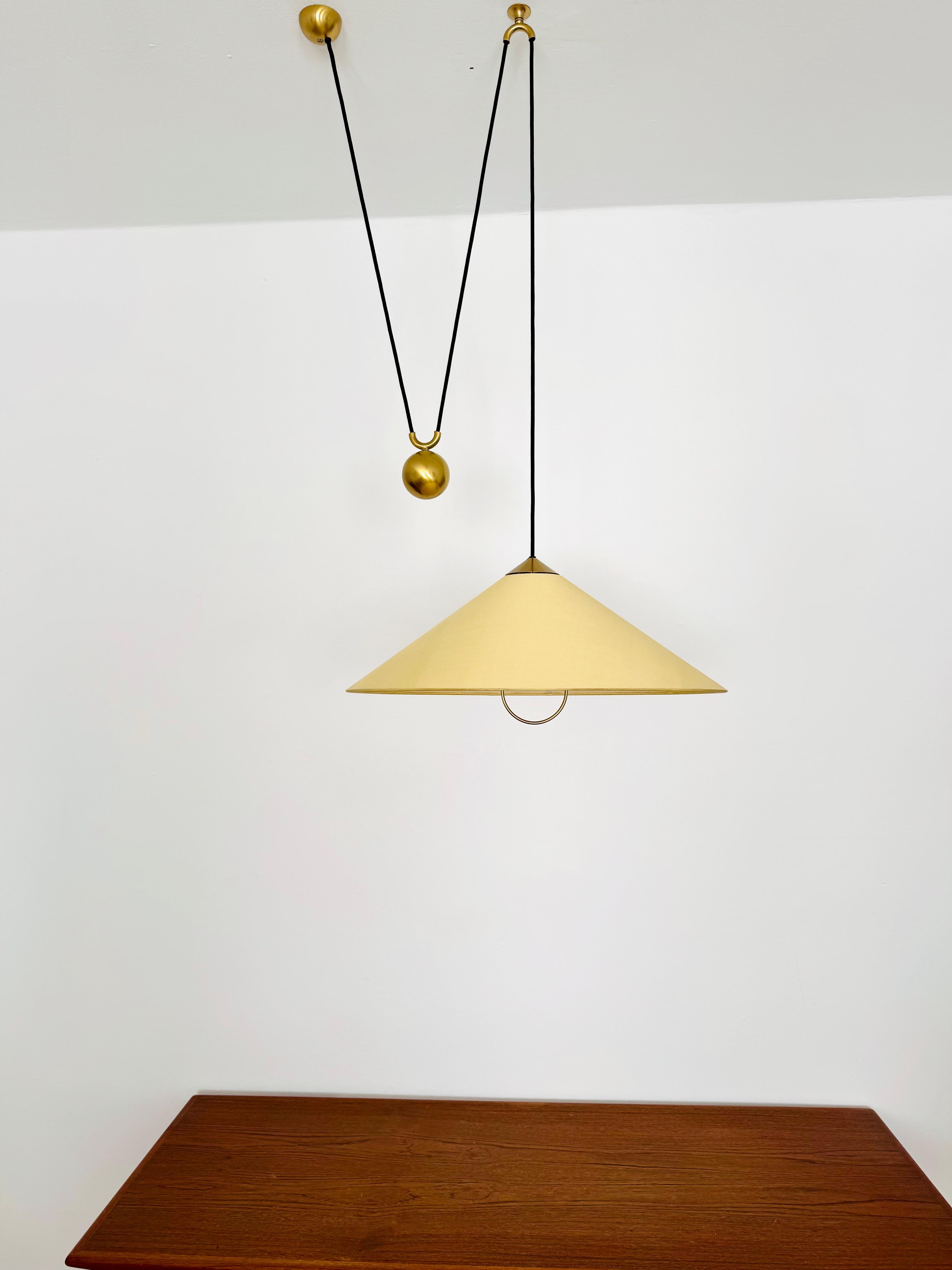 German Large Adjustable Pendant Lamp with Counterweight by Florian Schulz For Sale