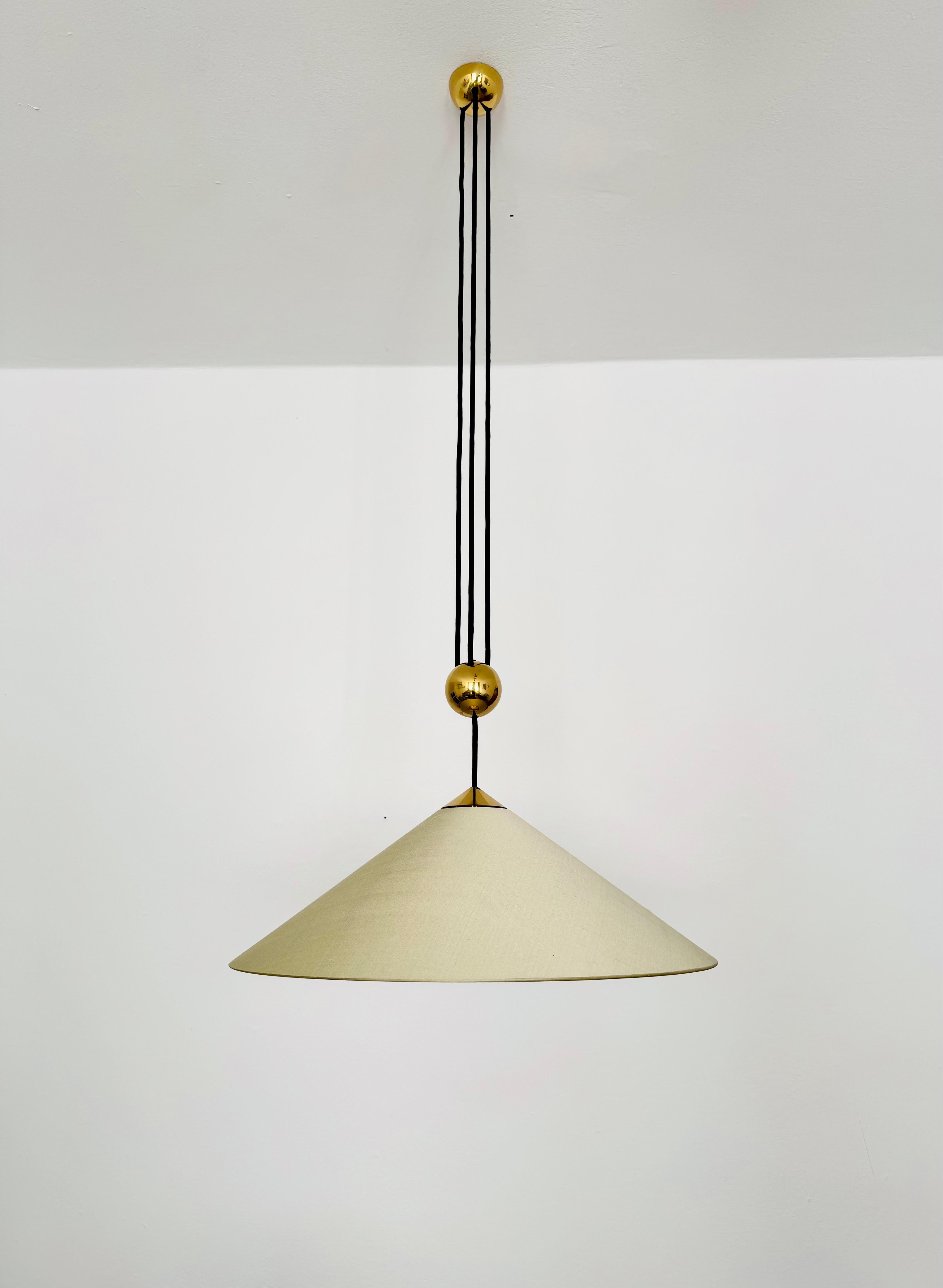 German Large Adjustable Pendant Lamp with Counterweight by Florian Schulz For Sale