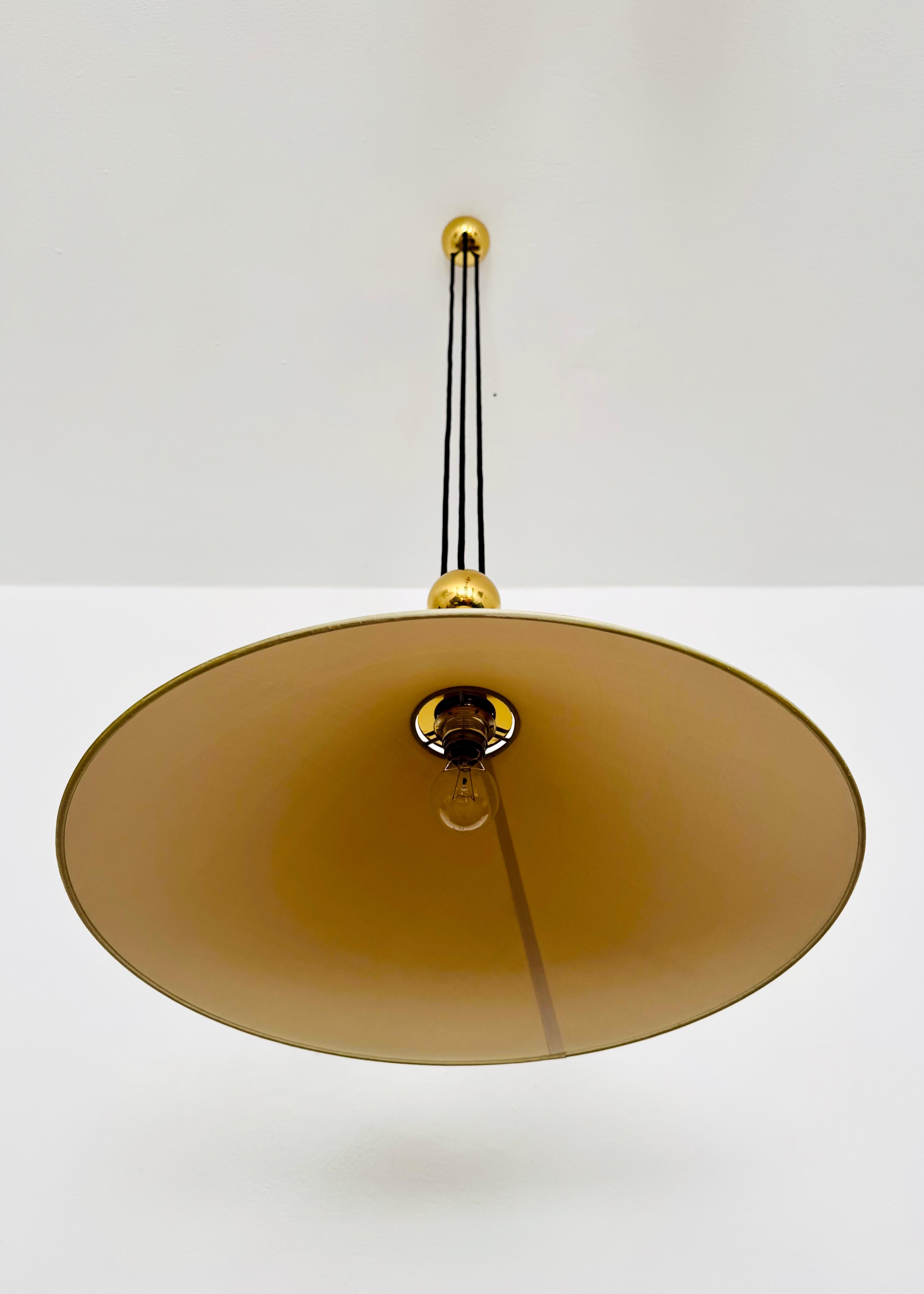 Large Adjustable Pendant Lamp with Counterweight by Florian Schulz For Sale 1