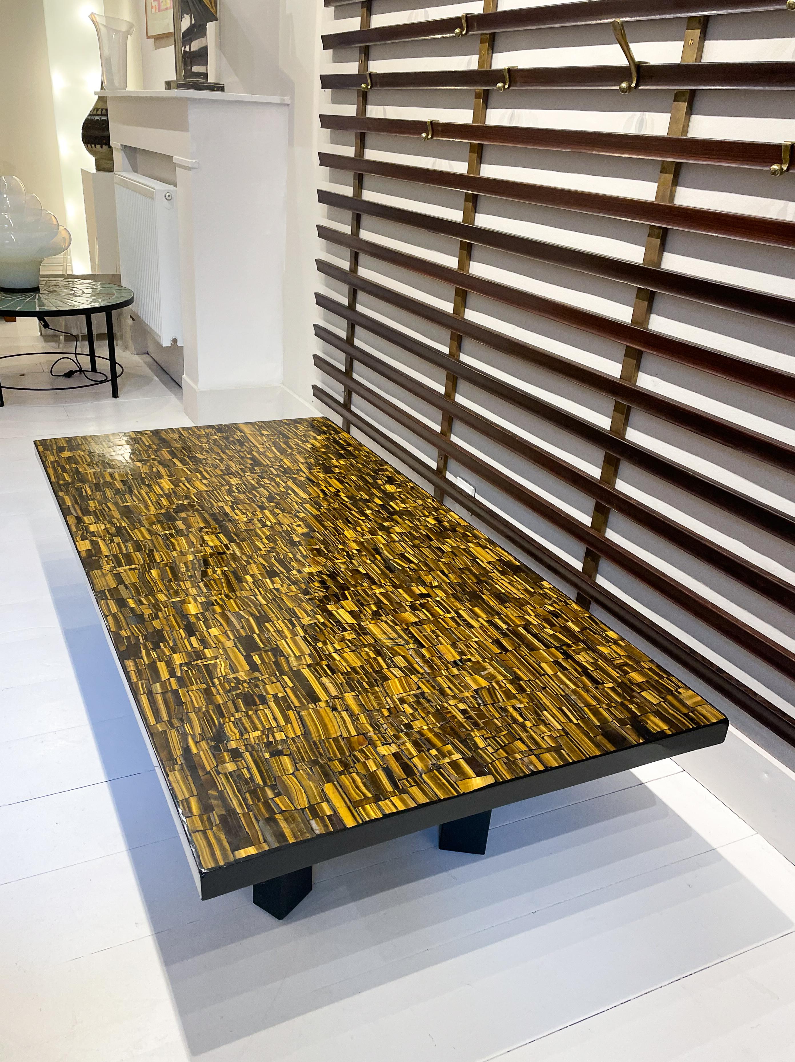 Large Ado Chale Coffee Table, Oeil de Tigre, Belgium

Metalworker by training, Belgian designer Ado Chale discovered mineralogy during a journey in Germany in the 1950’s. He cultivated his passion alongside his wife, Huguette Schaal, who became a