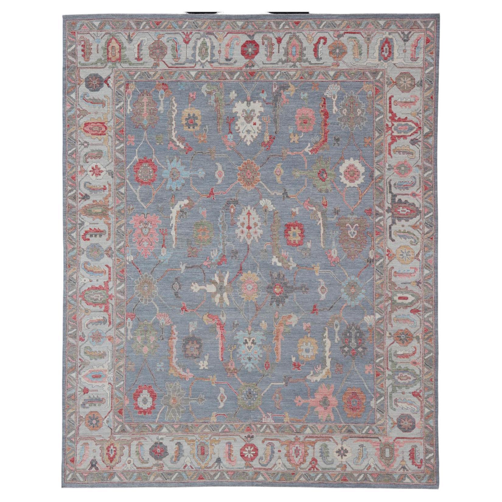 Large Afghan Oushak Design with All-Over Multi Colored Floral Design in Wool For Sale