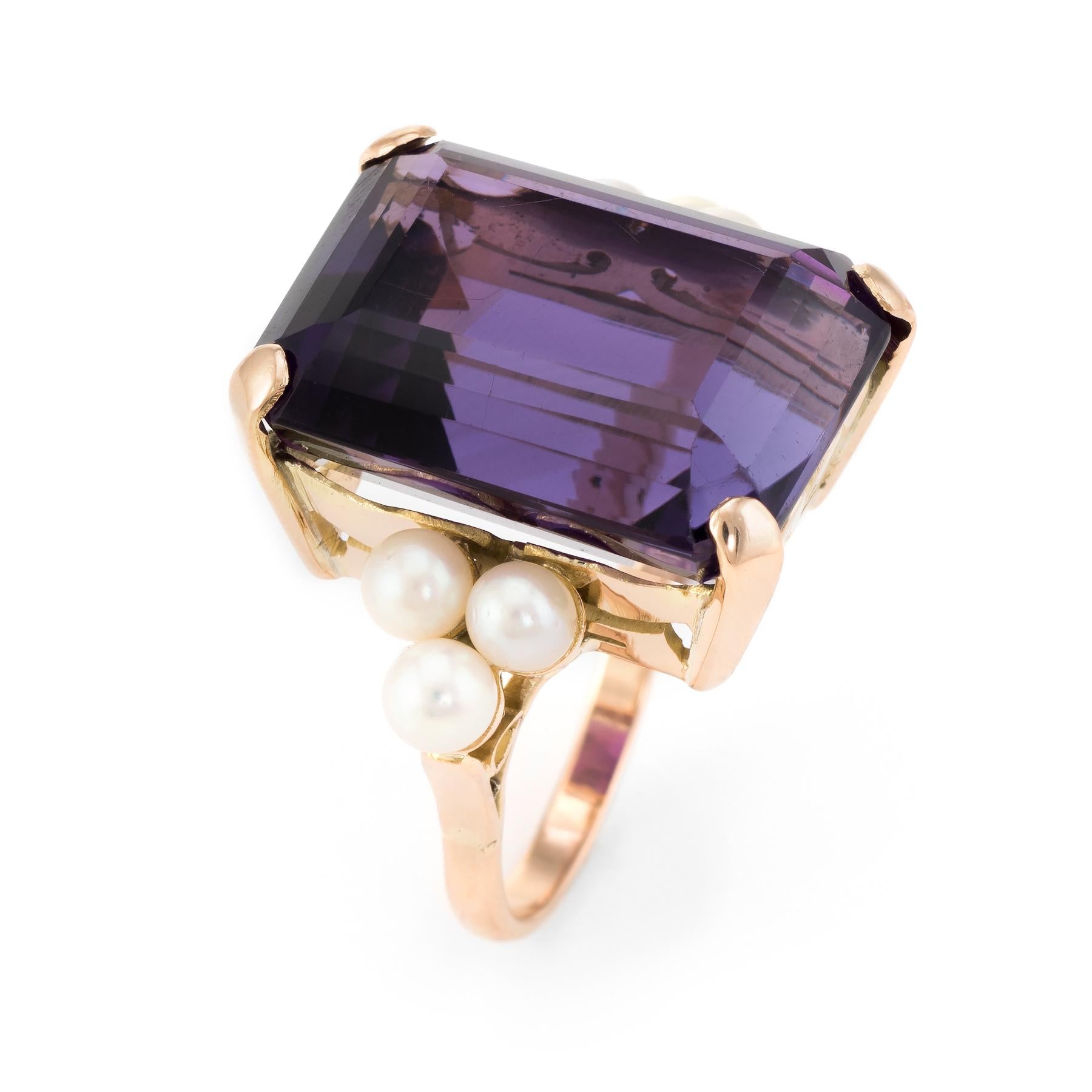 Elegant vintage cocktail ring (circa 1950s to 1960s), crafted in 14 karat rose gold. 

Centrally mounted emerald cut amethyst measures 20mm x 15mm (estimated at 25 carats), accented with six 4mm cultured pearls. The amethyst is in excellent