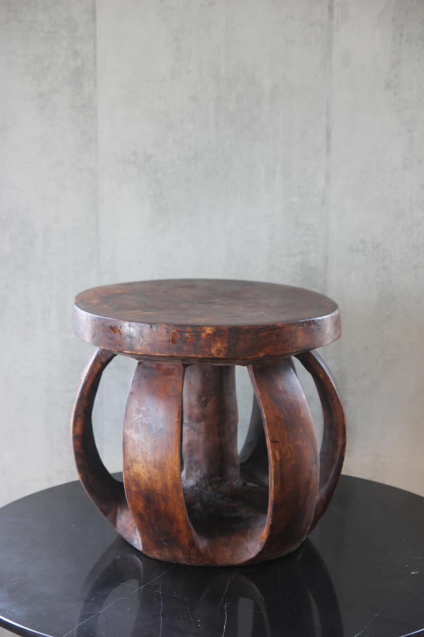 African Baga from Guinea-Bissau is a one-of-a-kind piece of furniture that is sure to add a touch of cultural elegance to your home decor. Handcrafted by skilled Baga artisans, this stool is made from high-quality wood and features intricate