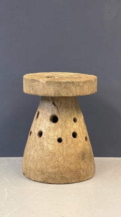 Large African mortar made of one solid wooden trunk