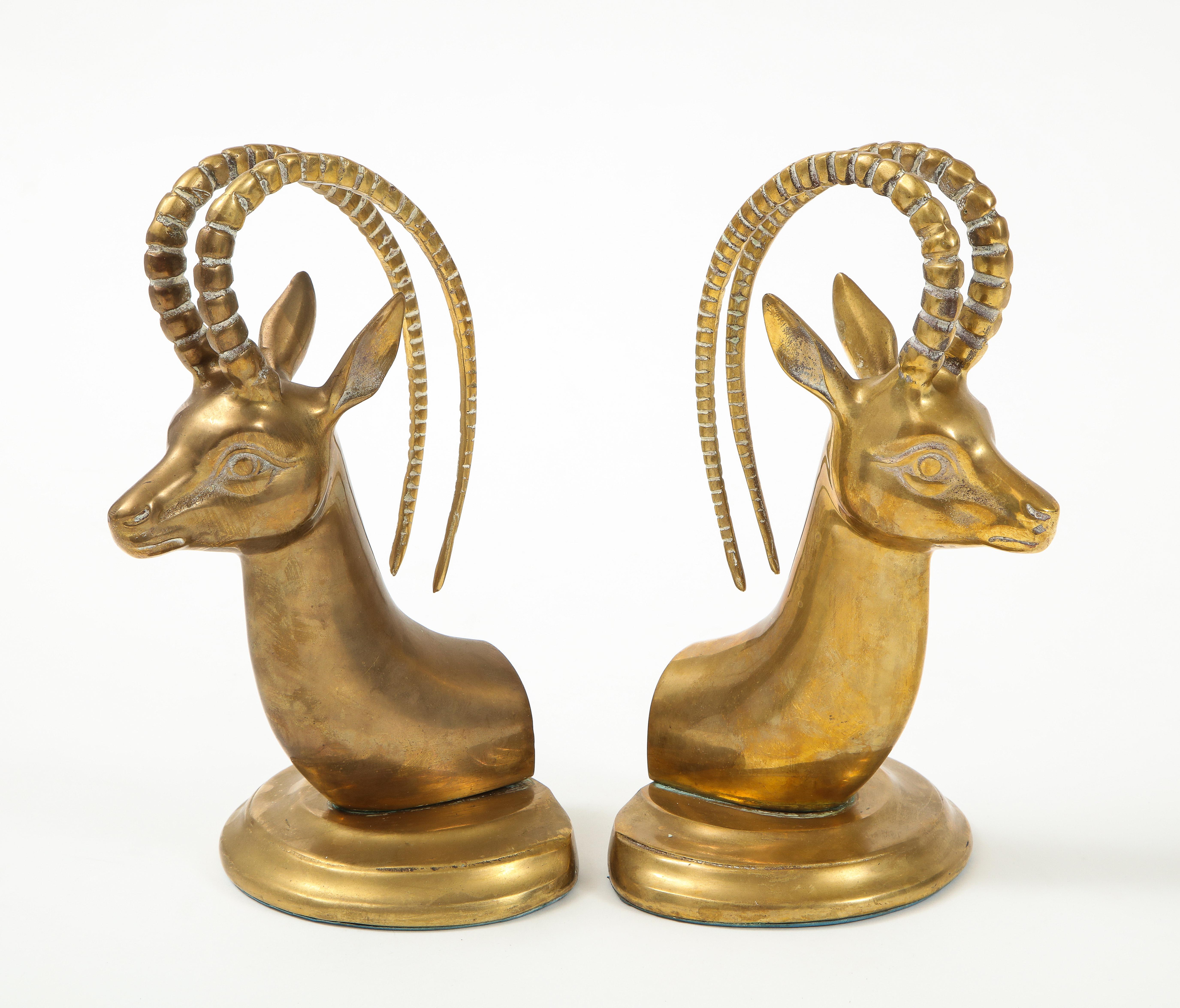 Pair of larger scale midcentury aged brass Ibex bookends.