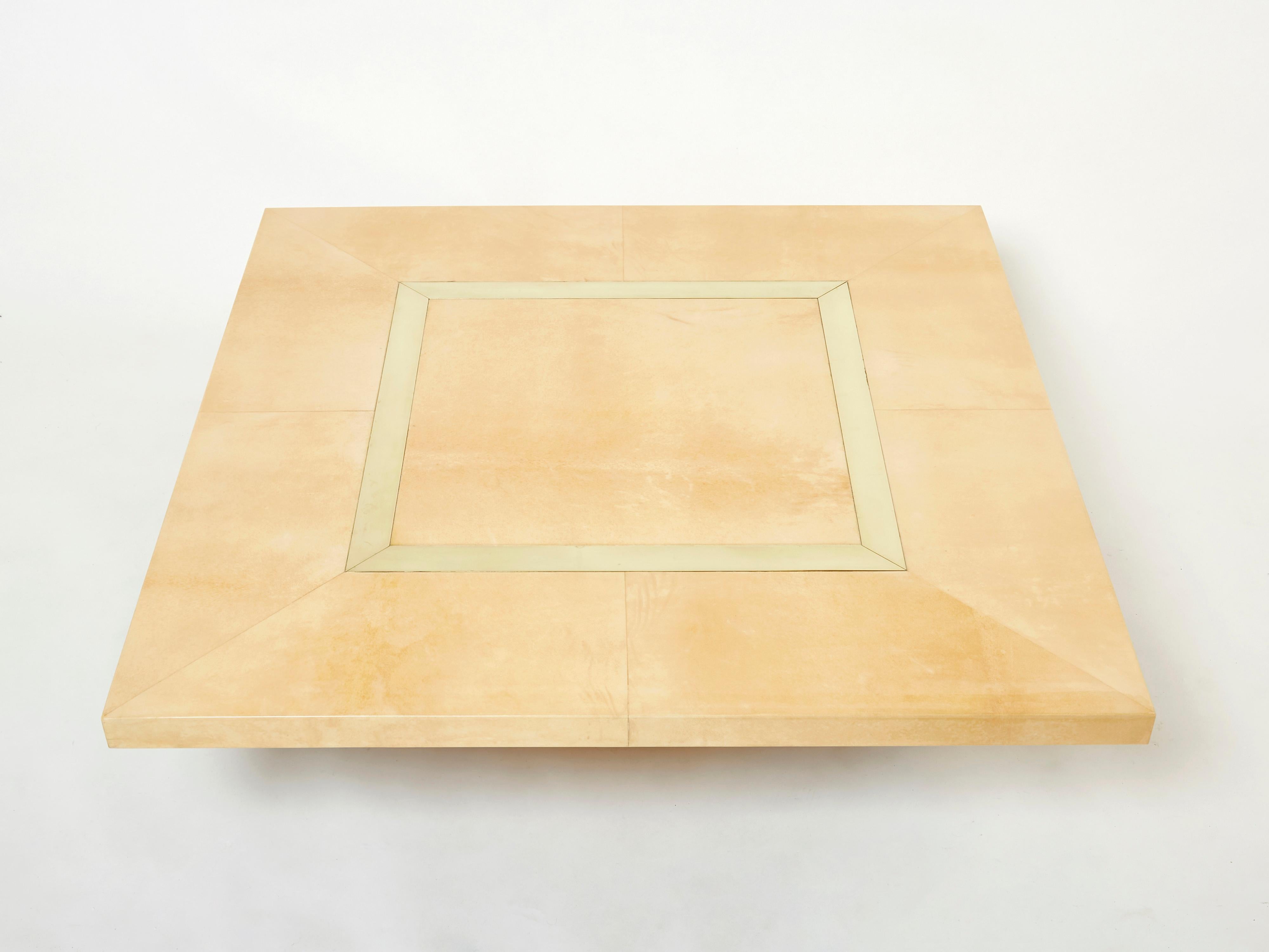The varnished goatskin parchment, in rich shades of beige, makes this coffee table typical of designer Aldo Tura. This large square piece would make a fascinating centerpiece for any living room. It’s been beautifully finished for a smooth, glossy
