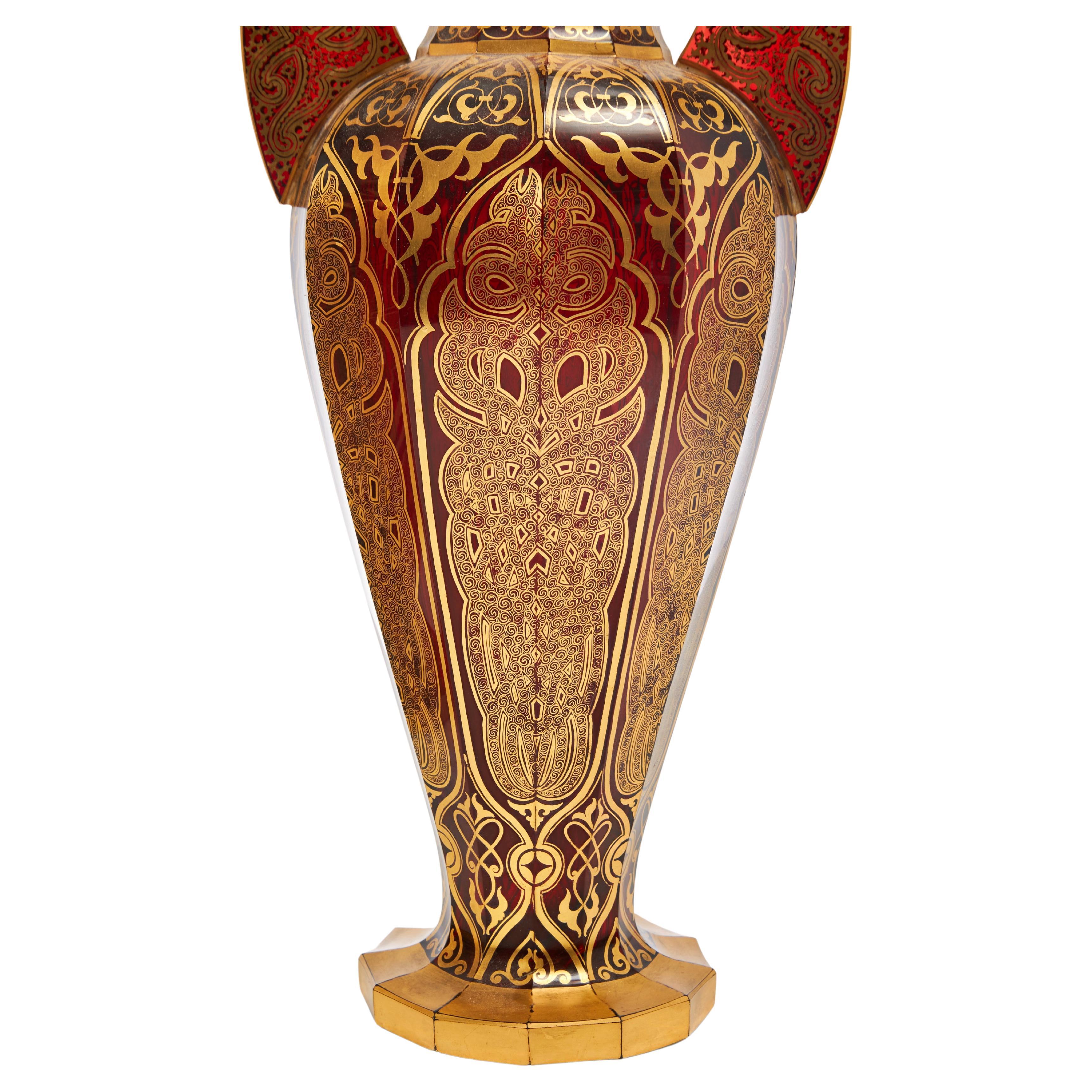 An exceptional Bohemian Harrach glass vase in Islamic design and gilding decoration all around

Hight 50 cm

Provenance: According to information: Kayser Wilhelm II (Purchased at auction after Schloss Wilhelmina, 1919 by the submitter's