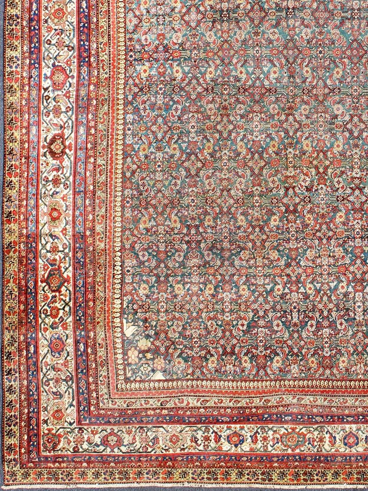 Large all-over antique Persian Sultanabad rug in green background.
Colorful all-over floral design antique Persian Sultanabad rug, rug ema-7512, country of origin / type: Iran / Sultanabad, circa 1900

This antique Persian Mahal relies heavily on