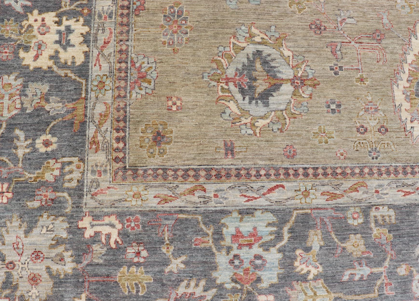 Wool Large All-Over Designed Tabriz with A Yellow-Taupe Background and Muted Colors For Sale