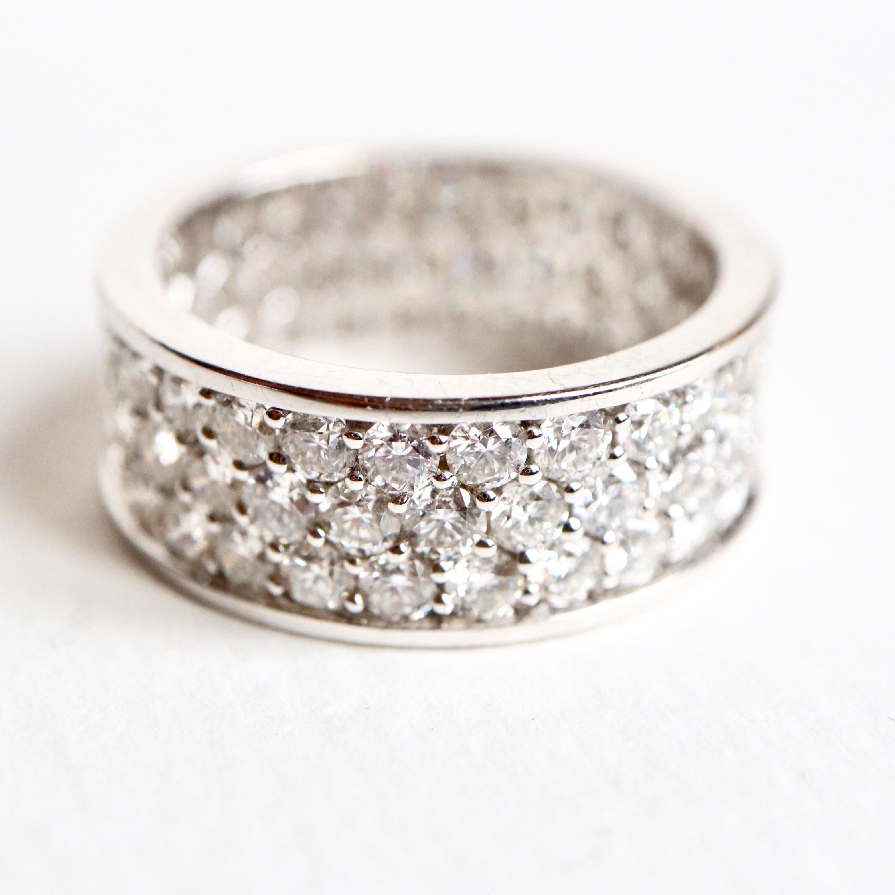 Large Alliance Ring in Diamonds and 18 carats White Gold
Gross Weight: 7.4g
4.16 Carats of Diamonds 
Diameter 17.5 mm, size 54.5, US Size 7