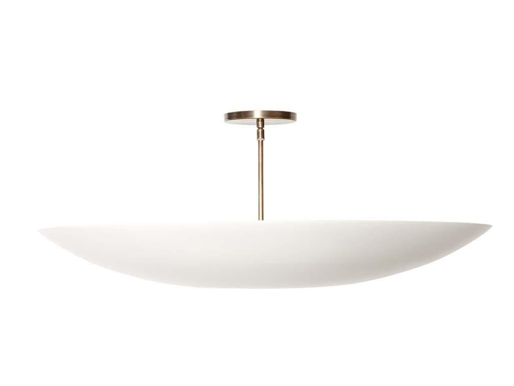 The Alta brass dome features a spun metal shade with a brass canopy and rod. The shade is available in brass or powdercoated metal finishes. Shown here in gloss white powdercoat and satin brass. 

The Lawson-Fenning Collection is designed and