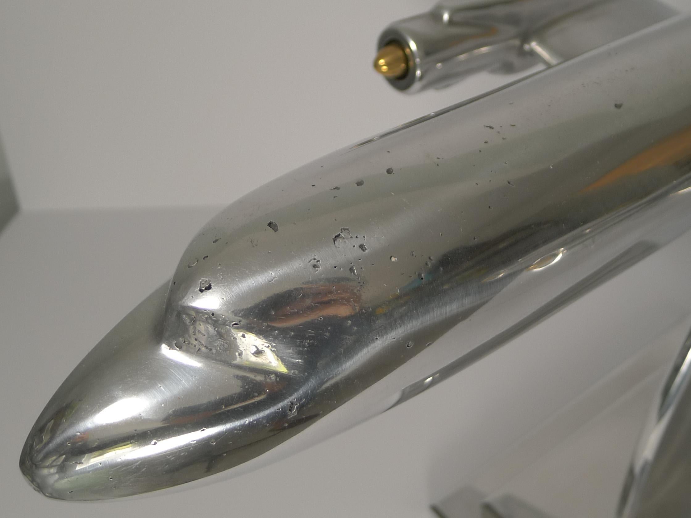 A fabulous and impressively sized aluminium model of a DC-7 plane which was built by the Douglas Aircraft Company from 1953-1958. It was the last major piston engine-powered transport made by Douglas, being developed shortly after the earliest jet