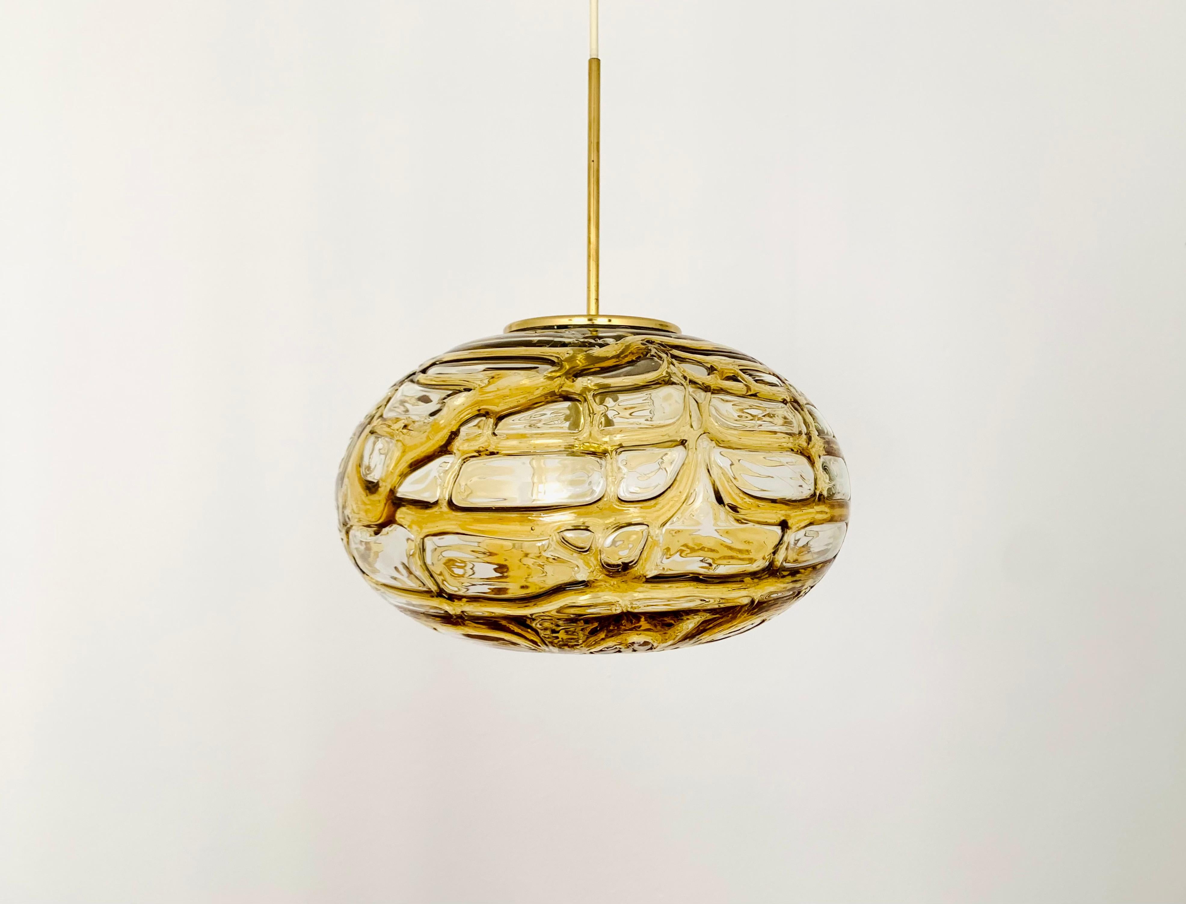 Very beautiful and large amber lamp by Doria from the 1960s.
Very elegant Hollywood Regency design with a fantastically glamorous look.
The structure in the glass creates a spectacular light.

Manufacturer: Doria

Condition:

Very good