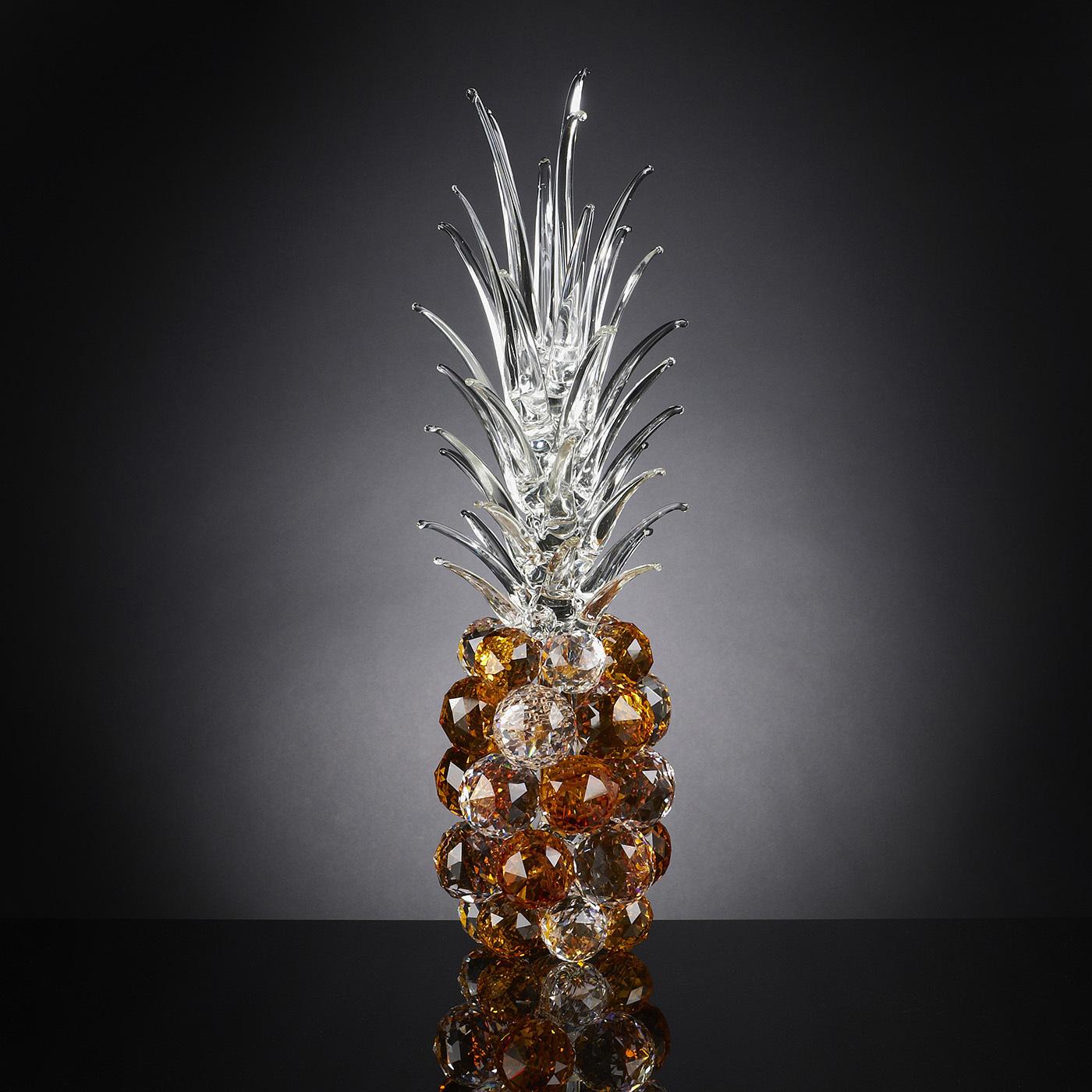 A superb objet d'art, this pineapple-shaped crystal sculpture will make a refined statement in an elegant and modern home. A superb showcase of craftsmanship, it is masterfully made by expert hands using traditional techniques that lend it a