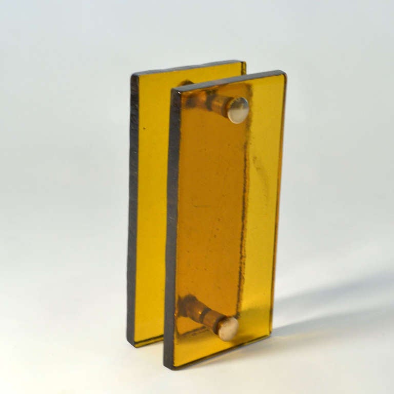 Large amber glass door handle with brass fittings for a glass door, France 1960s.
The fixings can be lengthened for wooden doors.
We have several of this model in amber, orange available.